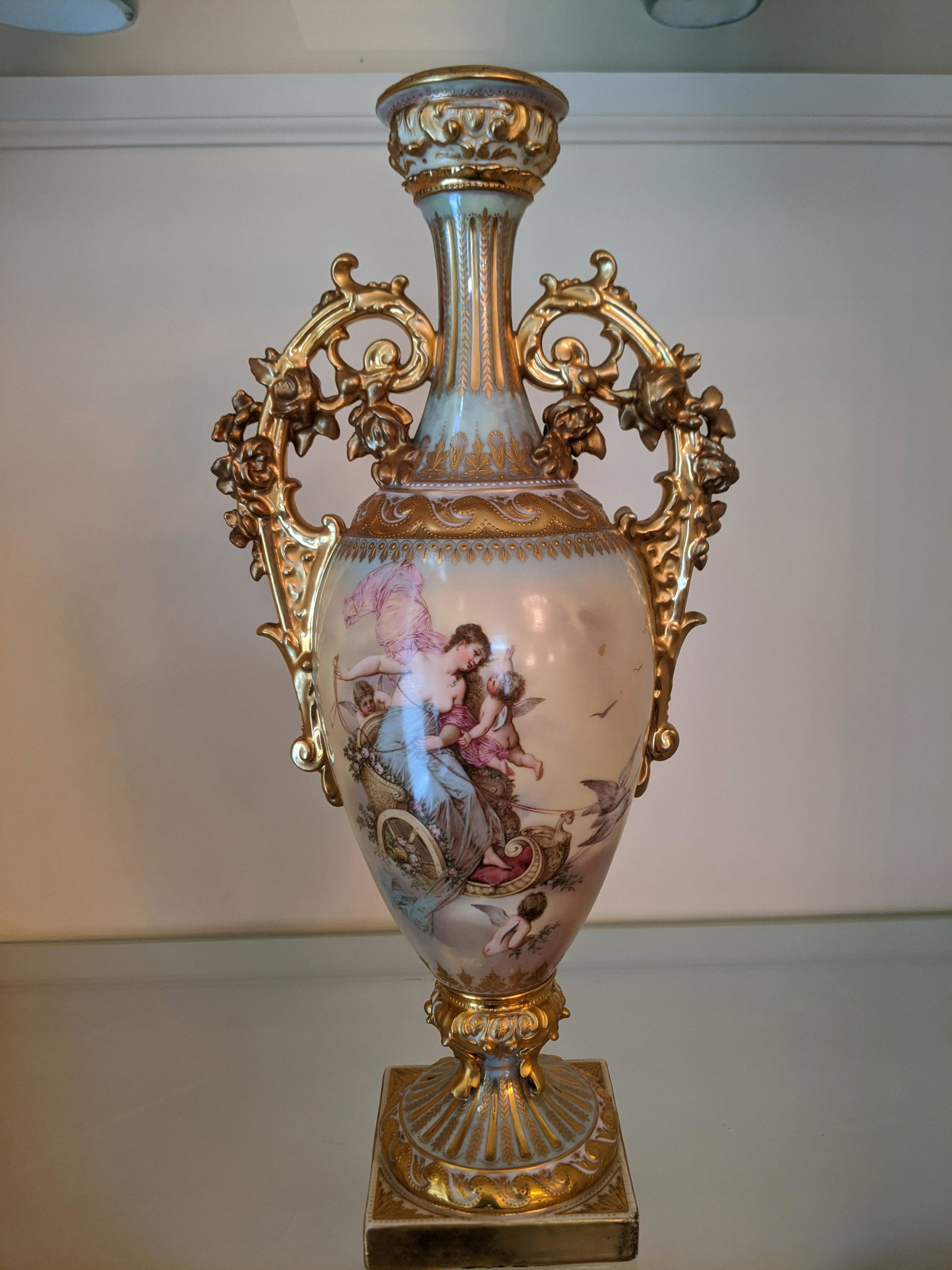 Antique Beehive Austria Venus Gold & Handpainted Vase: Antique Beehive Austria Venus Gold & Handpainted Vase with handles. Measurements in inches: 15 3/4 high Condition:Good with no chips, cracks or repairs Shipping:We offer in-house shipping. Item(s) wil