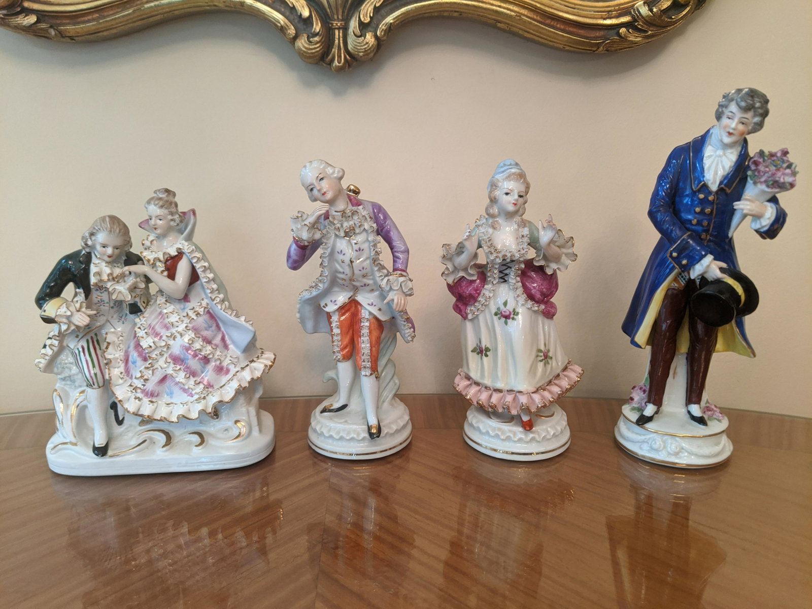 Lot 4 Bavarian Porcelain Victorian People Figurines: Lot 4 Bavarian Porcelain Victorian People Figurines , Some with markings on bottom. Measurements in inches: 7 1/2, 8 and 9 high Condition:Some chipping on sleeves of matched pair of figures Shipping:W
