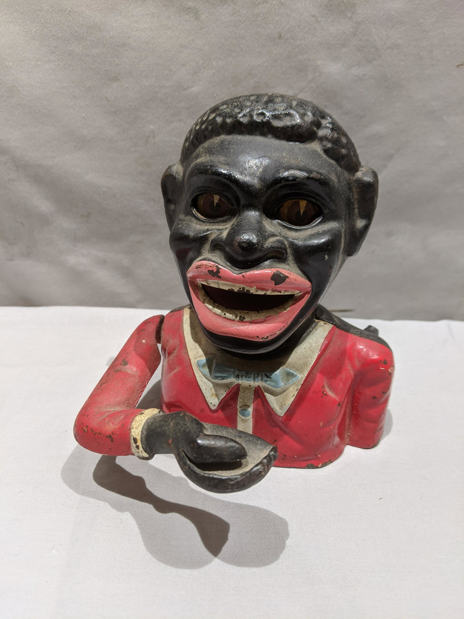Antique Original Jolly Boy Mechanical Cast Iron Bank: Antique Original Jolly Boy Mechanical Cast Iron Bank. Measurements in inches: 6 1/2 high Condition:Some wear to paint Shipping:We offer in-house shipping. Item(s) will be packed after invoice is paid 
