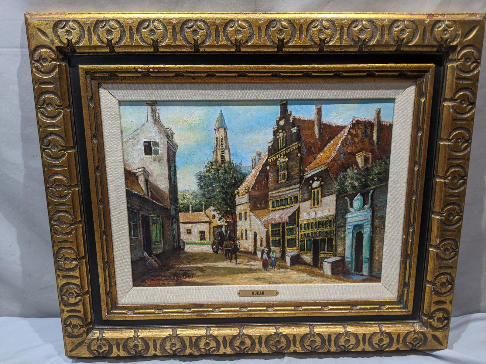 Signed Ruban Bavarian Village Oil Painting: Signed Ruban Bavarian Village Oil Painting on canvas in frame. Double signed lower left. Measurements in inches: 24 x 20, Image: 16 x 12 Condition:Good with no problems Shipping:We offer in-house ship