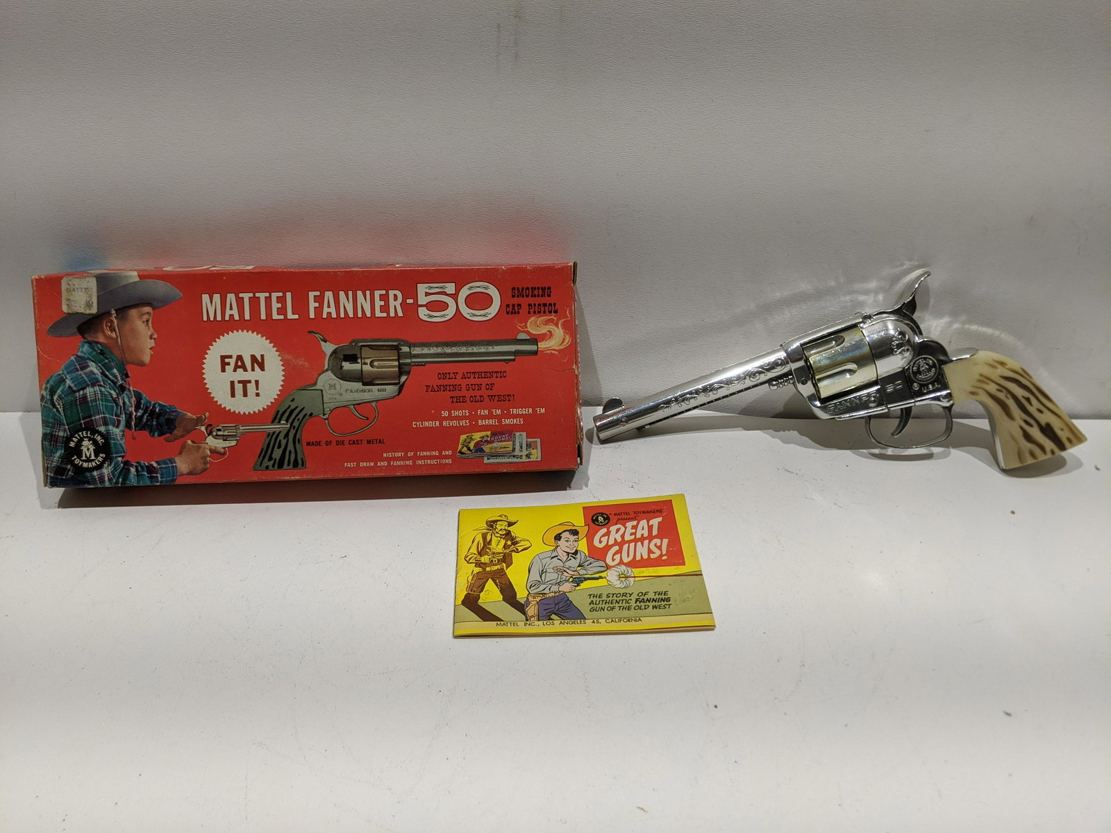 1950's Mattel Fanner-50 Smoking Cap Pistol Gun w/ Box: 1950's Mattel Fanner-50 Smoking Cap Pistol Gun with box and comic book. Condition:Mild wear with age, one inner flap loose on box Shipping:We offer in-house shipping. Item(s) will be packed after invo
