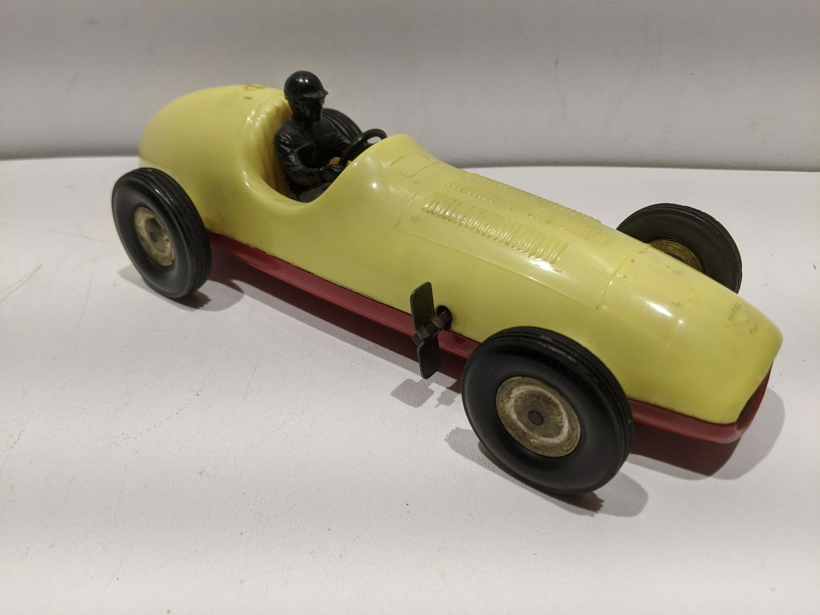 1950's Pagliuso Plastic Wind Up Jet Race Car: 1950's Pagliuso Plastic Wind Up Jet Race Car. Measurements in inches: 11 1/2 long Condition:Normal wear with age and use Shipping:We offer in-house shipping. Item(s) will be packed after invoice is pa
