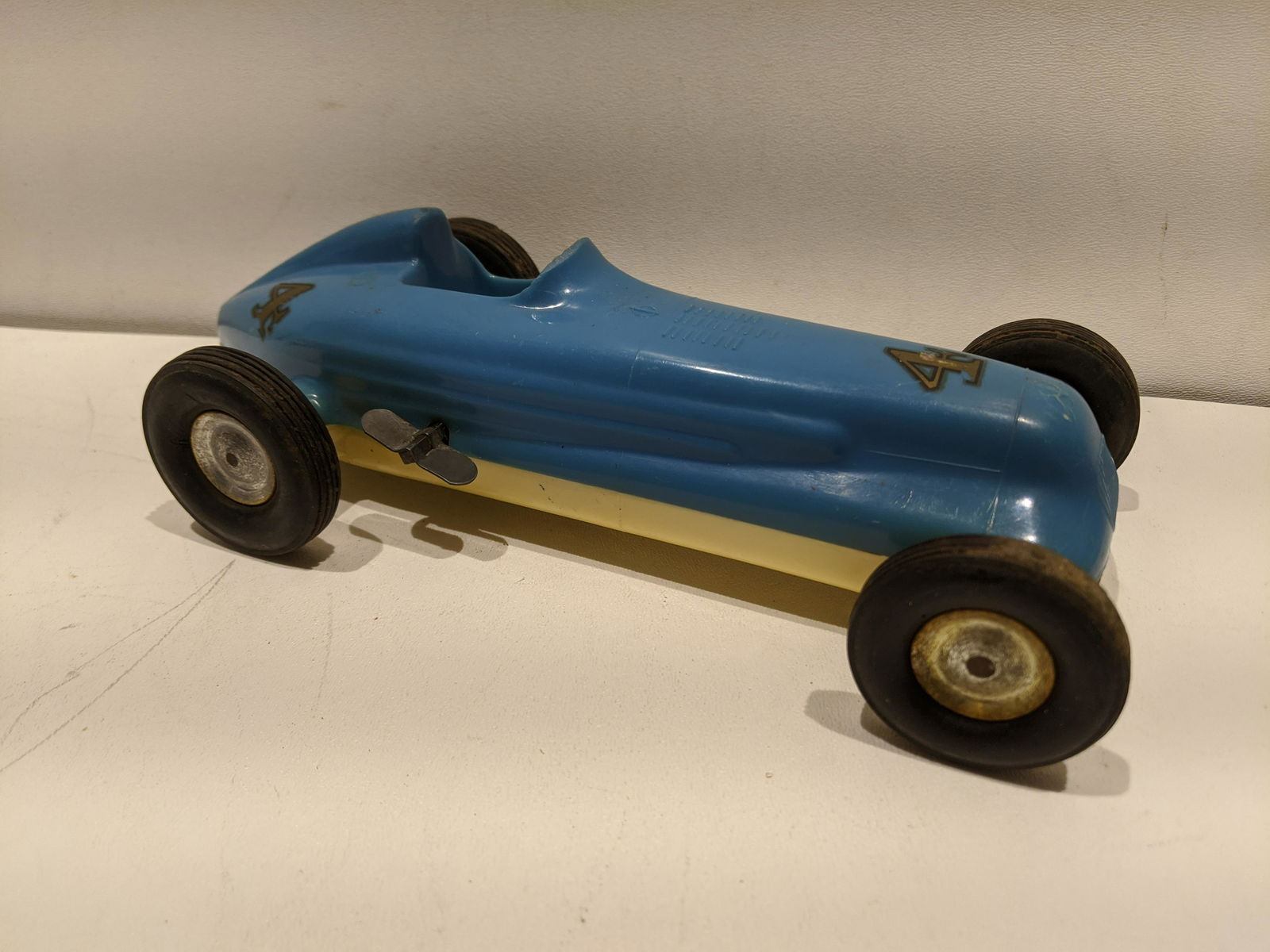 1950's Rite Spot Plastic Wind Up Jet Race Car #4: 1950's Rite Spot Plastic Wind Up Jet Race Car #4. Measurements in inches: 9 long Condition:Normal wear with age and use Shipping:We offer in-house shipping. Item(s) will be packed after invoice is pai