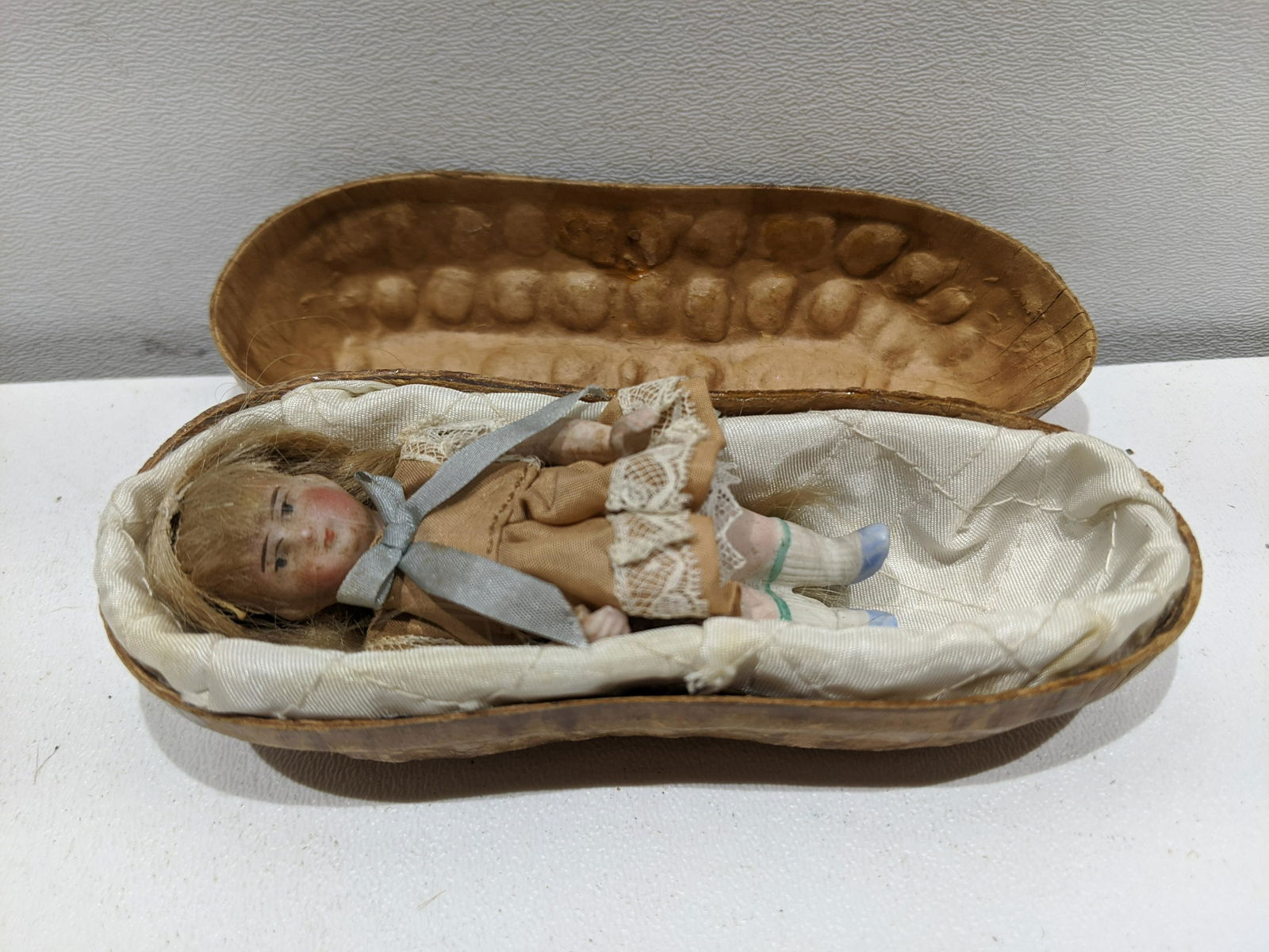 Antique Small Bisque Doll in Peanut Shell Case (1 of 5)