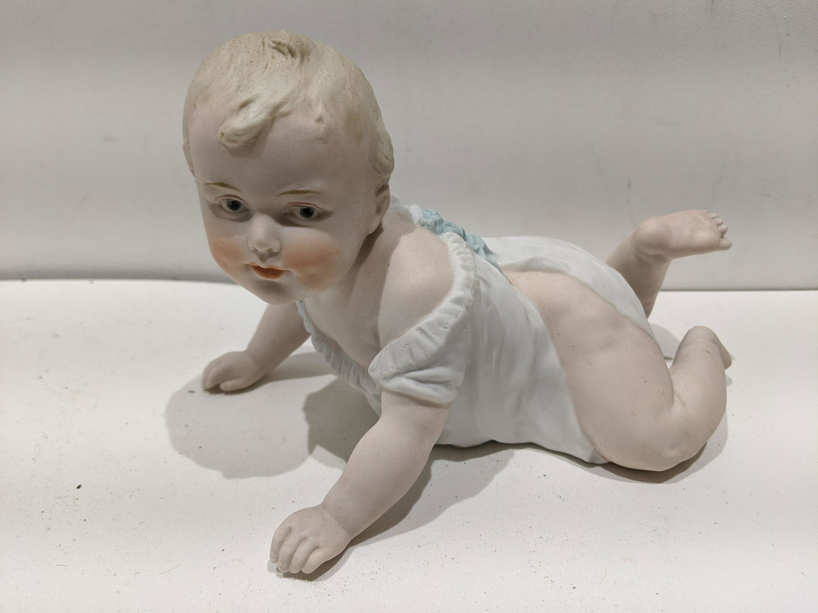 Vintage Marked Porcelain Piano Baby Figurine (1 of 6)