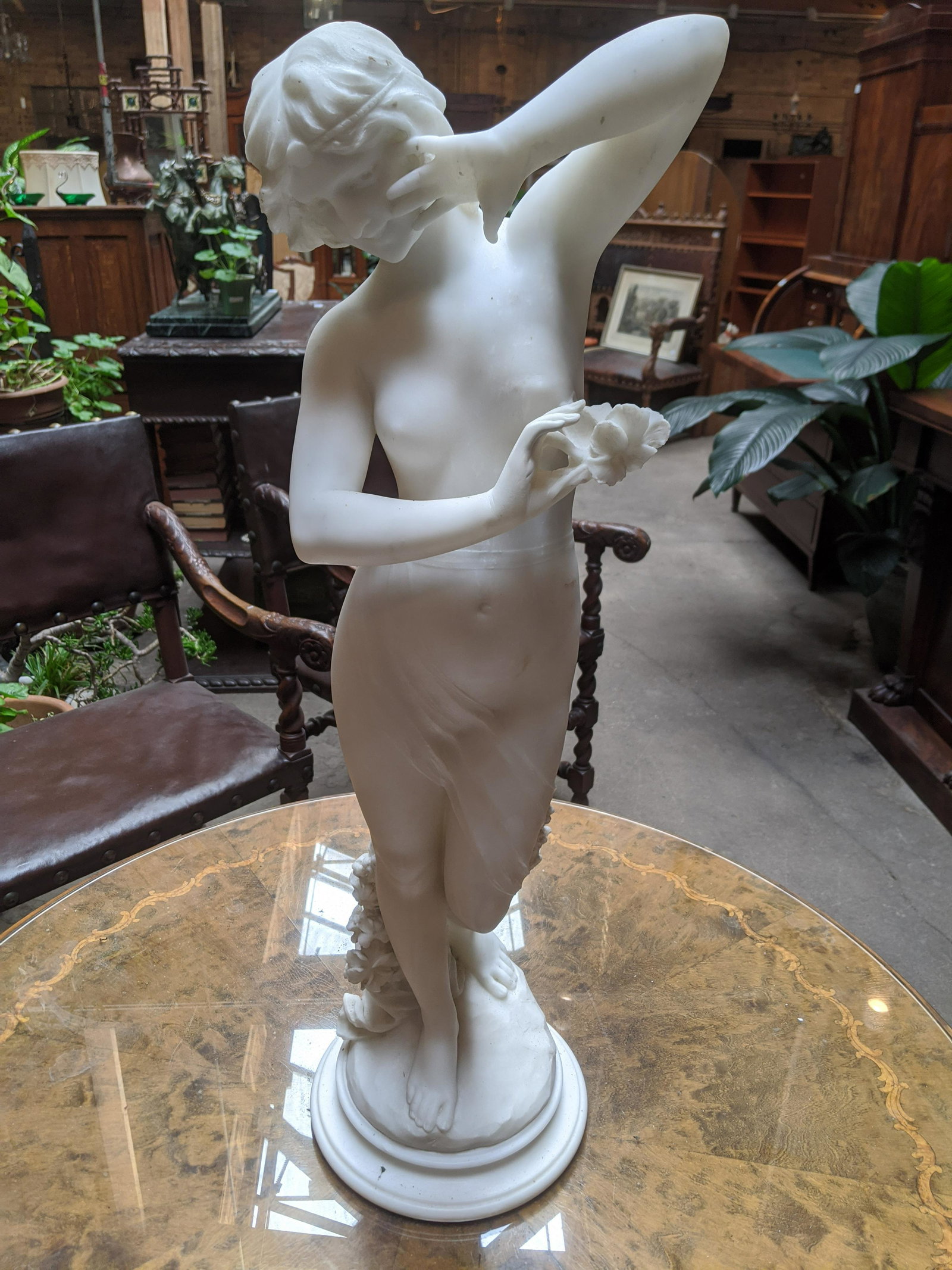 Antique Tall Carved White Marble Nude Woman: Antique Tall Carved White Marble Nude Woman. Measurements in inches: 32 high x 10 diameter Condition:Some chipping on flowers Shipping:Buyer to arrange pick up (no charge) or packing and shipping. We 
