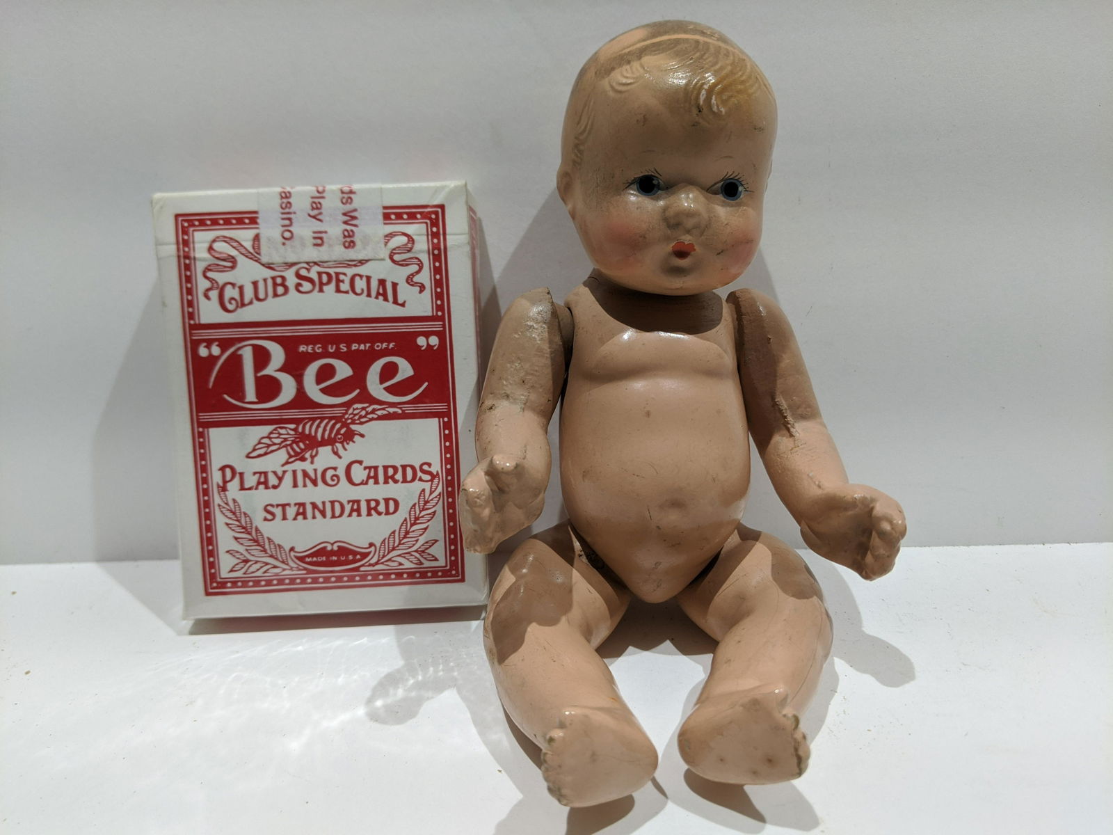 Early Composition Effanbee Baby Tinyette Doll: Early Composition Effanbee Baby Tinyette Doll. Measurements in inches: 6 1/2 long Condition:Has chip underneath and general wear Shipping:We offer in-house shipping. Item(s) will be packed after invoi