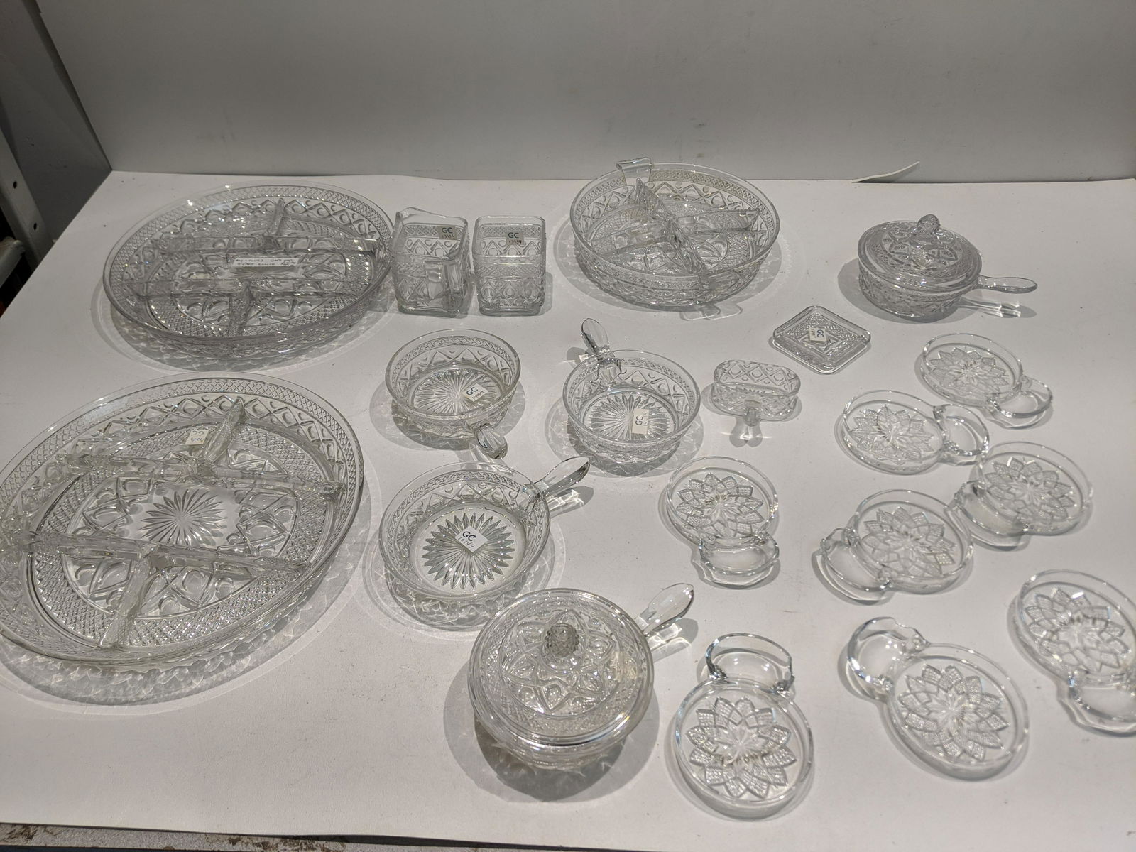 Lot 19 Fostoria Cape Cod Items Relish Trays Coasters et: Lot 19 Fostoria Cape Cod Items Relish Trays Coasters, handled bowls etc. Condition:As found, Sold as is. No obvious cracks or chips Shipping:We offer in-house shipping. Item(s) will be packed after in