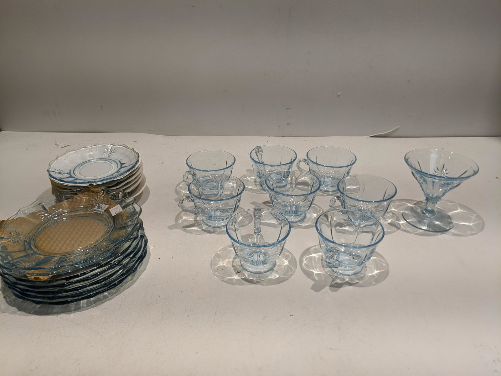 Lot 24 Blue Tint Baroque Cups Saucers Plates & Wine: Lot 24 Blue Tint Baroque Cups Saucers Plates & Wine. Condition:As found, Sold as is. No obvious cracks or chips Shipping:We offer in-house shipping. Item(s) will be packed after invoice is paid and sh