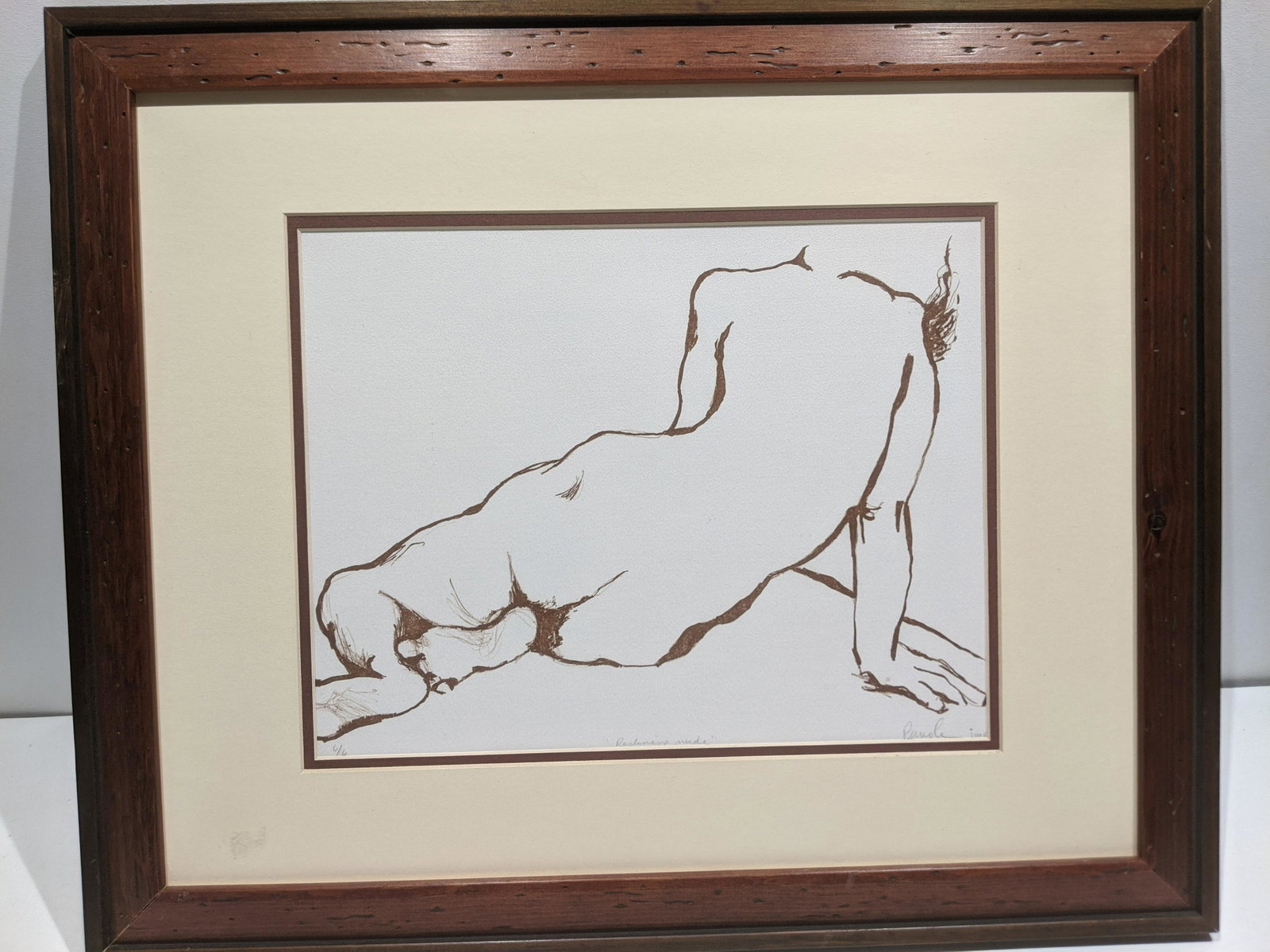 Paugle Signed Reclining Nude Ltd Ed Print: Paugle Signed Reclining Nude Ltd Ed Print framed under glass. Pencil signed, titled and numbered. Measurements in inches: 23 x 19, image: 13 x 10 Condition:Good with no problems Shipping:We offer in-h