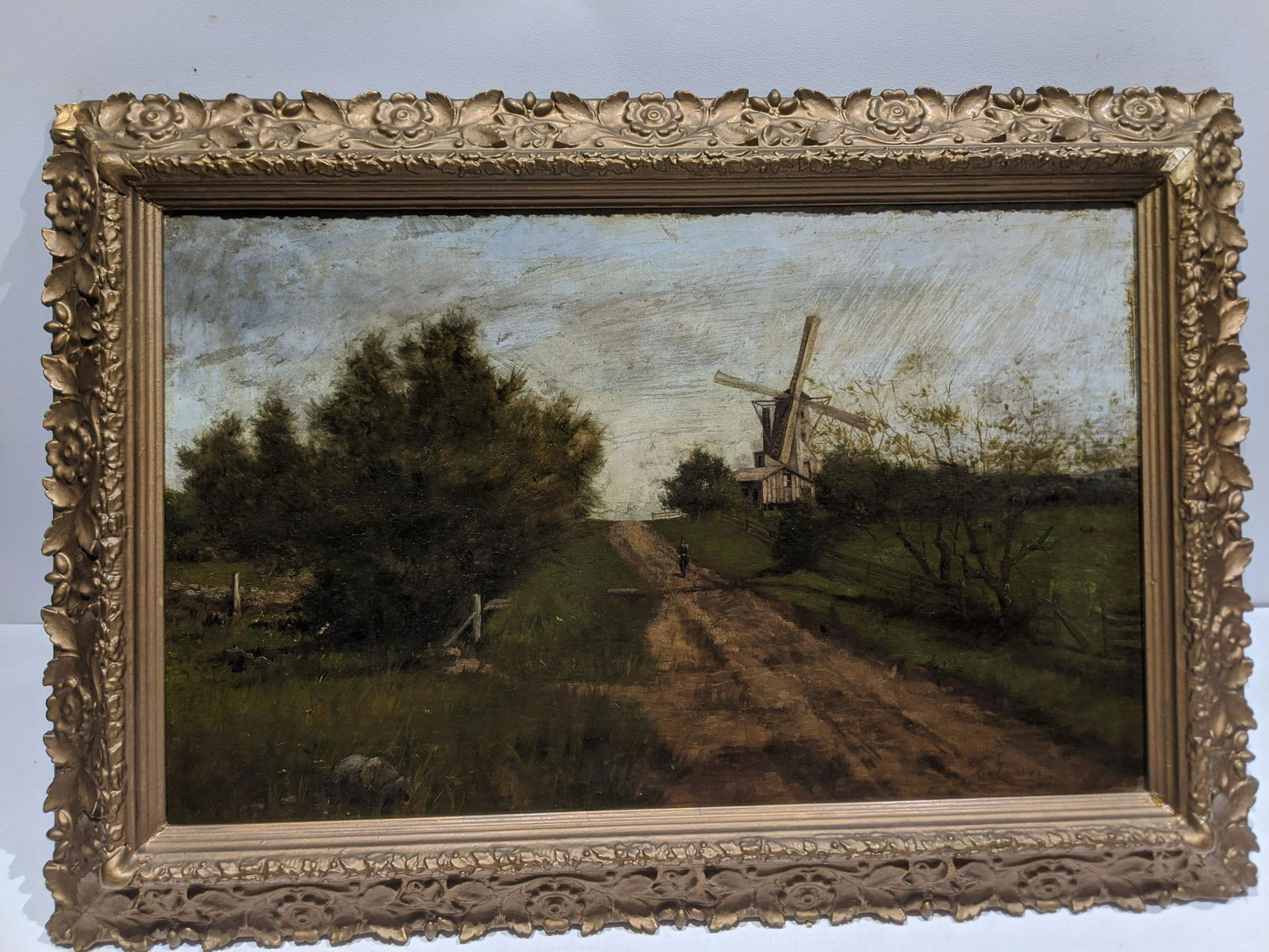 Frank Enders Windmill Country Road Oil Painting: Frank Enders Windmill Country Road Oil Painting on canvas in frame. Listed Wisconsin artist born 1860 and died 1921. Measurements in inches: 30 1/2 x 20 1/2, image: 25 x 15 1/2 Condition:Has craquelur