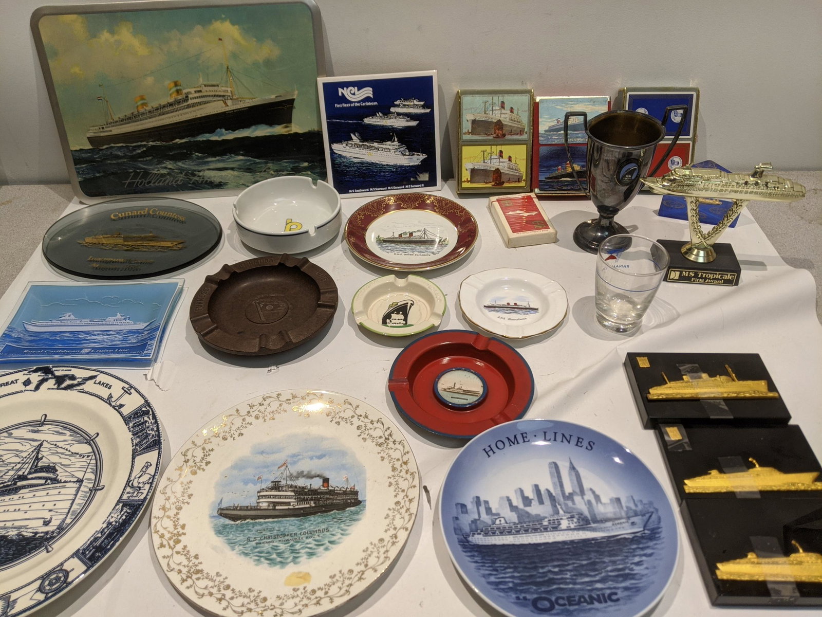 Large Lot Assorted Vintage Steamship Memorabilia: Large Lot Assorted Vintage Steamship Memorabilia including Plates, cards, paperweights, trophies ashtrays etc. Condition:Normal wear with age and use Shipping:We offer in-house shipping. Item(s) will 