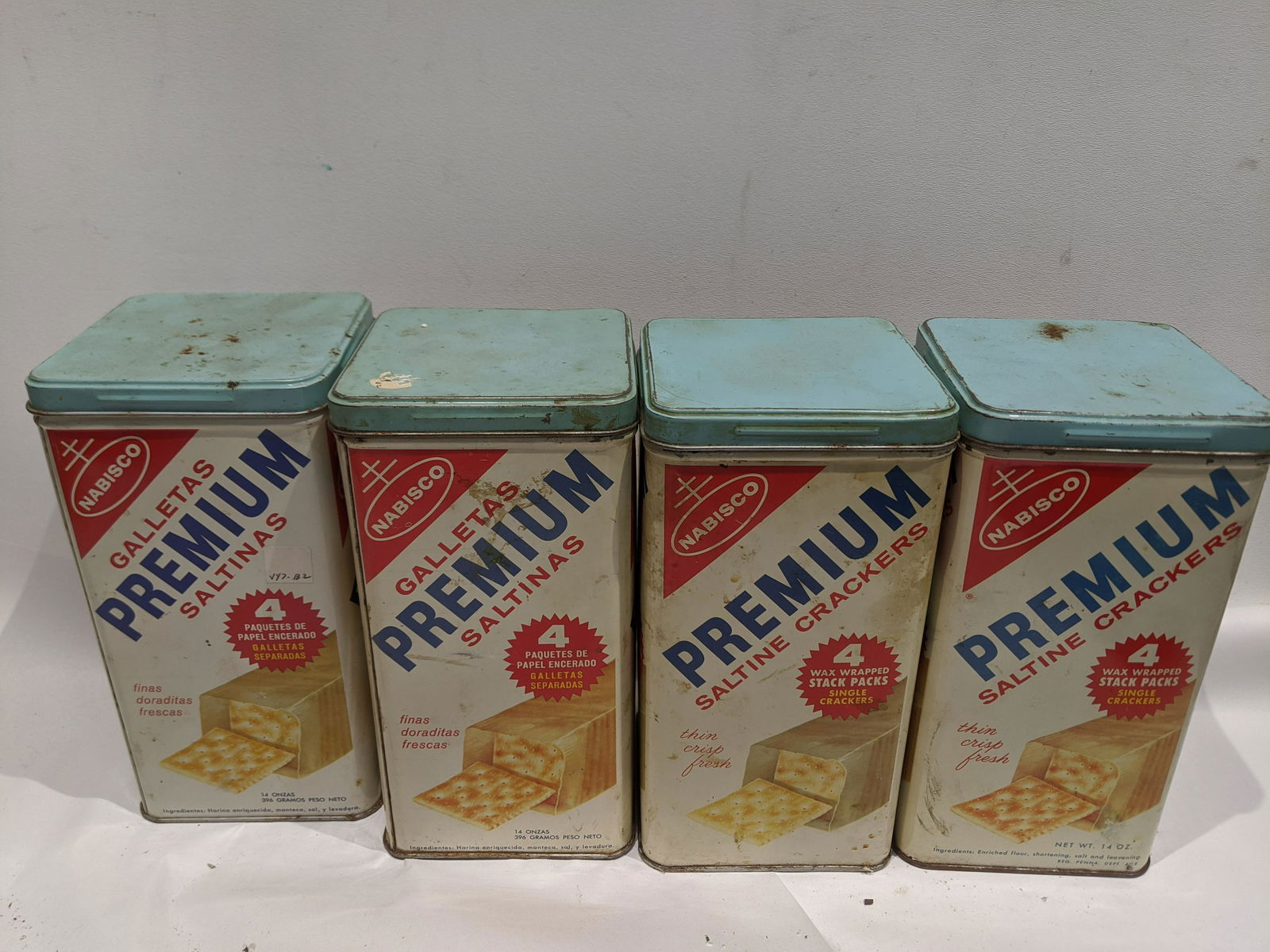 Lot 4 Vintage Nabisco Premium Saltine Cracker Tins: Lot 4 Vintage Nabisco Premium Saltine Cracker Tins. Measurements in inches: 9 high x 5 x 5 Condition:Has scratches and mild surface rust Shipping:We offer in-house shipping. Item(s) will be packed aft