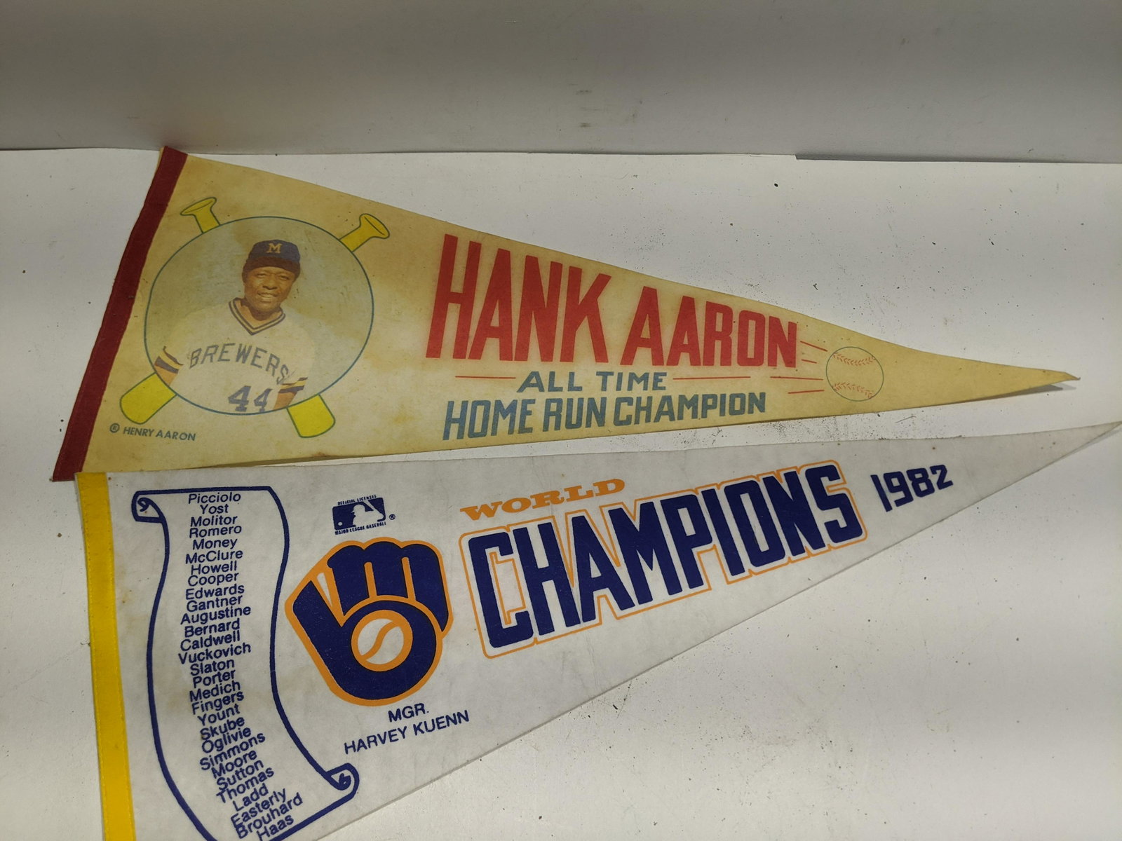 2 Old Milwaukee Brewers Baseball Pennants Hank Aarorn: 2 Old Milwaukee Brewers Baseball Pennants Hank Aaron and 1992 World Champions. Measurements in inches: 30 long Condition:Has fading Shipping:We offer in-house shipping. Item(s) will be packed after in