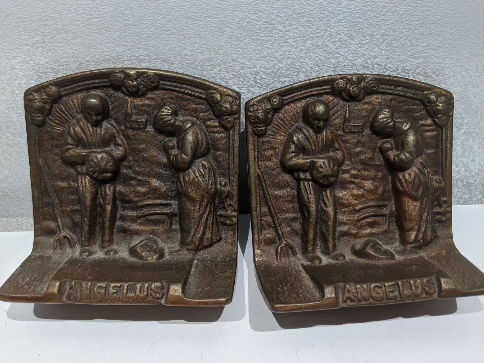 Antique Farmers Angelus Prayer Cast Iron Bookends: Antique Farmers Angelus Prayer Cast Iron Bookends. Measurements in inches: 4 high x 4 1/4 x 2 Condition:Good with no problems Shipping:We offer in-house shipping. Item(s) will be packed after invoice