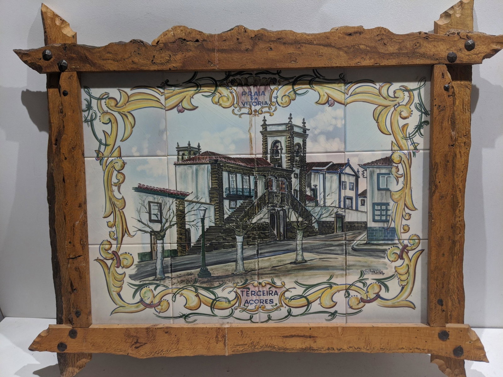D Fortuna Portugal Street Painting on Tile: D Fortuna Portugal Street Painting on Tilein wood frame. Titled top and bottom and signed lower right. Measurements in inches: 32 x 26, image: 23 x 17 Condition:Has some light craquelure Shipping:We o