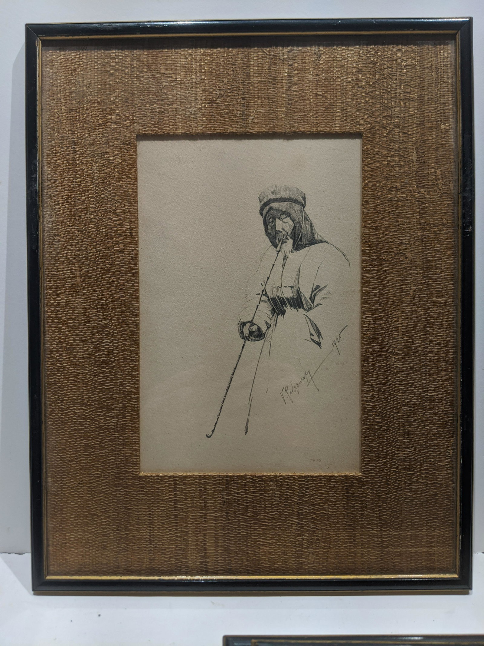 Victor Podgourski Pencil Drawing Chinese Man with Pipe: Victor Podgourski Pencil Drawing Chinese Man with Pipe framed under glass. Signed lower right and dated 1925. Listed Russian artist born 1893 and died 1969. Measurements in inches: 10 1/2 x 13 1/2, Im