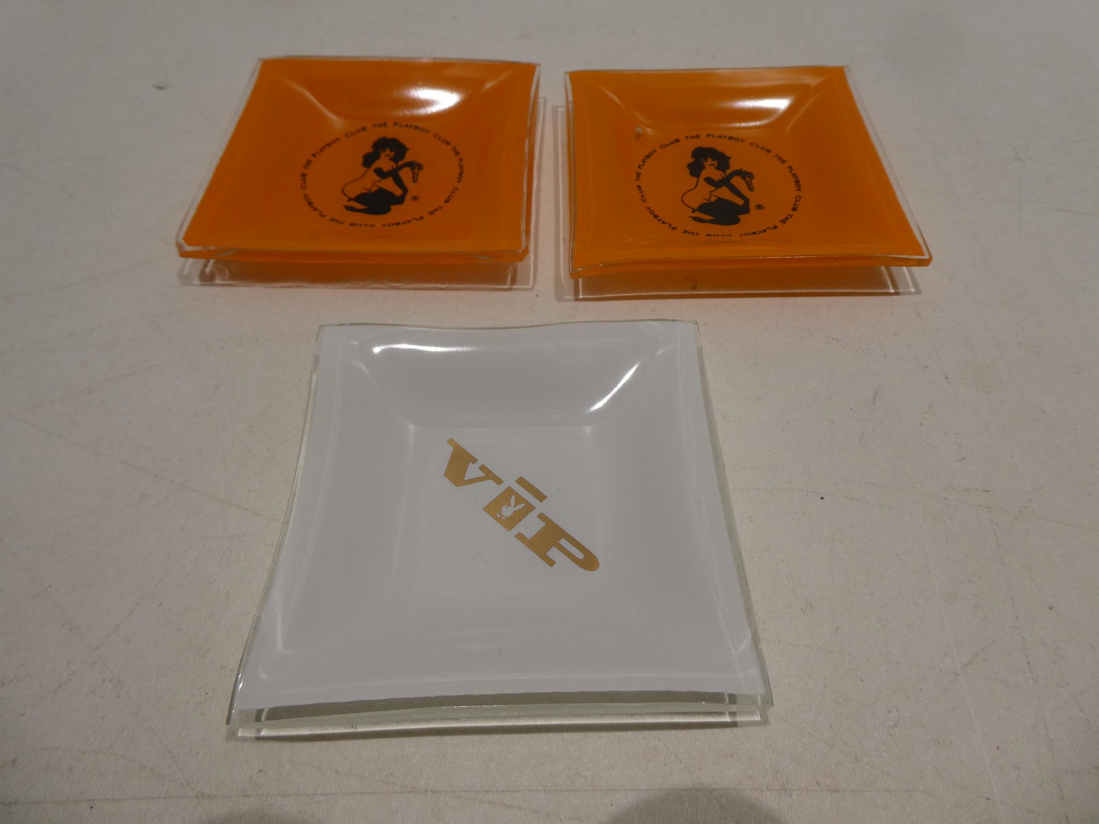 Set 3 Glass VIP Playboy Club Ashtrays: Set 3 Glass VIP Playboy Club Ashtrays. Measurements in inches: 3 3/4 square Condition:Good with no chips, cracks or repairs Shipping:We offer in-house shipping. Item(s) will be packed after invoice is