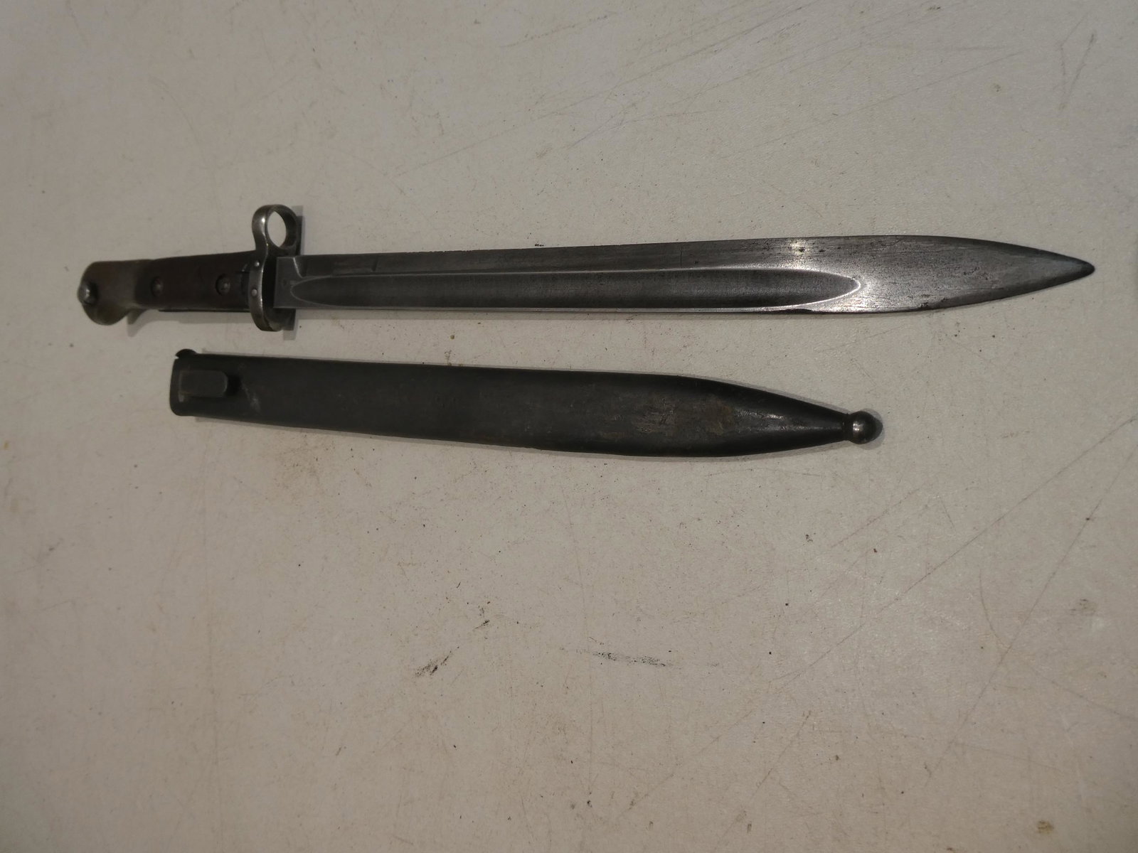 WWII Zbrojovka Brno Czech Bayonet w/ Sheath: WWII Zbrojovka Brno Czech Bayonet w/ Sheath. Measurements in inches: 17 long Condition:Normal wear with age and use Shipping:We offer in-house shipping. Item(s) will be packed after invoice is paid an