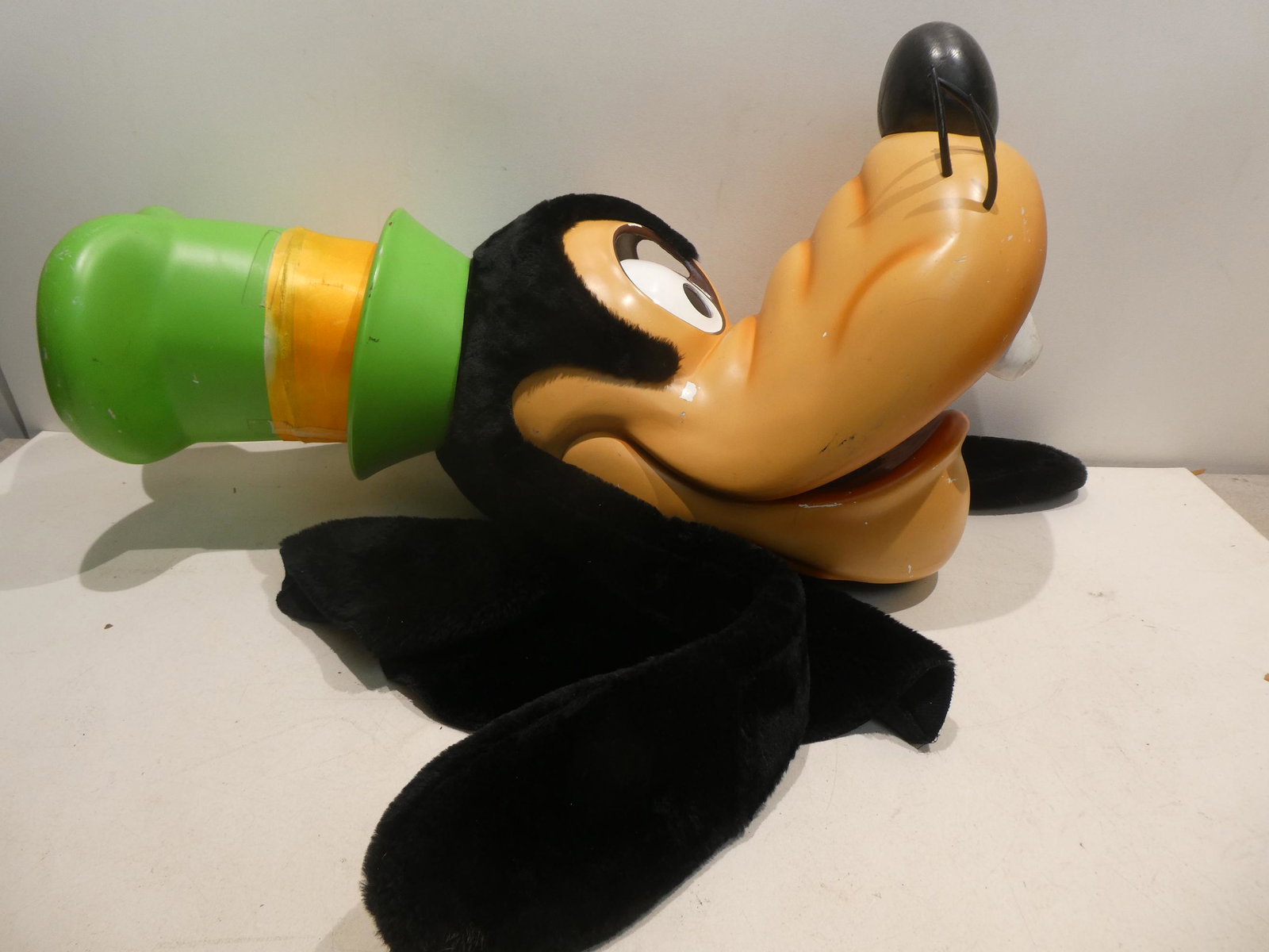 Large Vintage Disney Pluto Costume Head: Large Vintage Disney Pluto Costume Head. Measurements in inches: 23 high Condition:Has wear with age and use. Has a crack on one edge Shipping:We offer in-house shipping. Item(s) will be packed after 