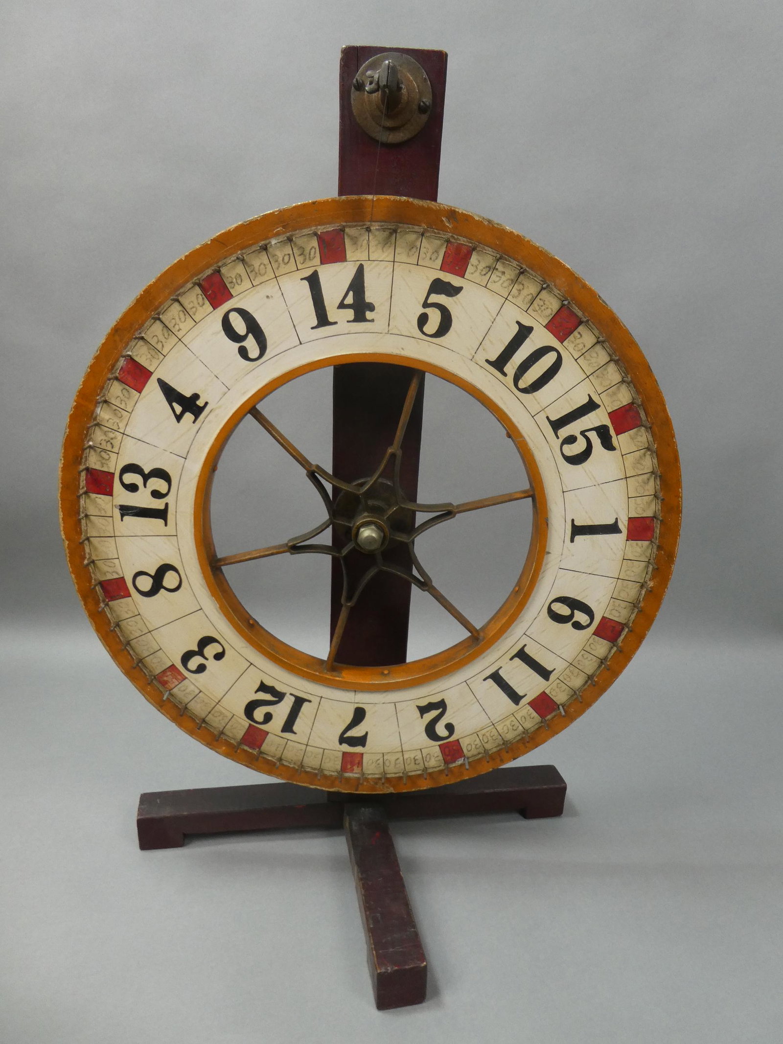 Antique Wood & Brass Roulette Wheel w/ Stand: Antique Wood & Brass Roulette Wheel w/ Stand. Measurements in inches: 29 high x 21 diameter wheel Condition:Mild wear with age and use Shipping:We offer in-house shipping. Item(s) will be packed after