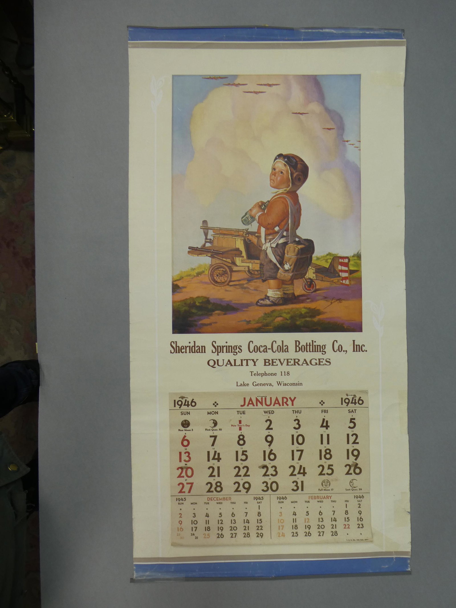 1946 Coca-Cola Bottling Co Wall Calendar Grounded: 1946 Coca-Cola Bottling Co Wall Calendar with Litho of painting by Grounded by RJ Stuart. Measurements in inches: 30 x 15 Condition:Has wrinkles and toning Shipping:We offer in-house shipping. Item(s)