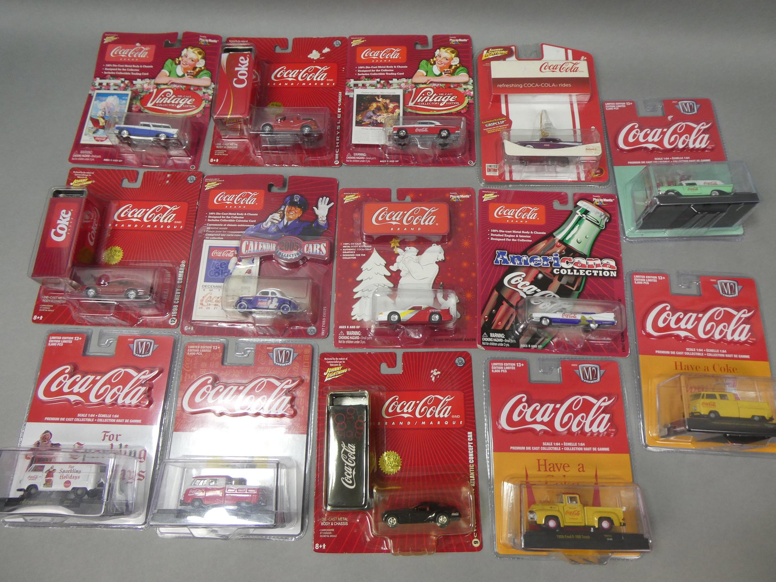 Lot 14 Coca-Cola Die Cast Vehicles in Packages: Lot 14 Coca-Cola Die Cast Vehicles in Packages. Condition:New in packages Shipping:We offer in-house shipping. Item(s) will be packed after invoice is paid and shipping charge will be invoiced seperat