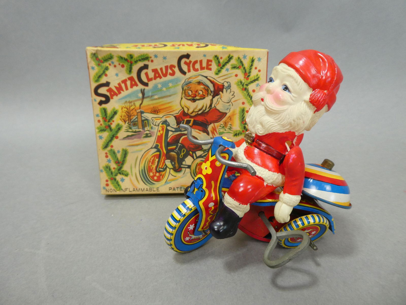 Suzuki Japan Tin Wind-up Santa Claus Cycle in Box (1 of 7)