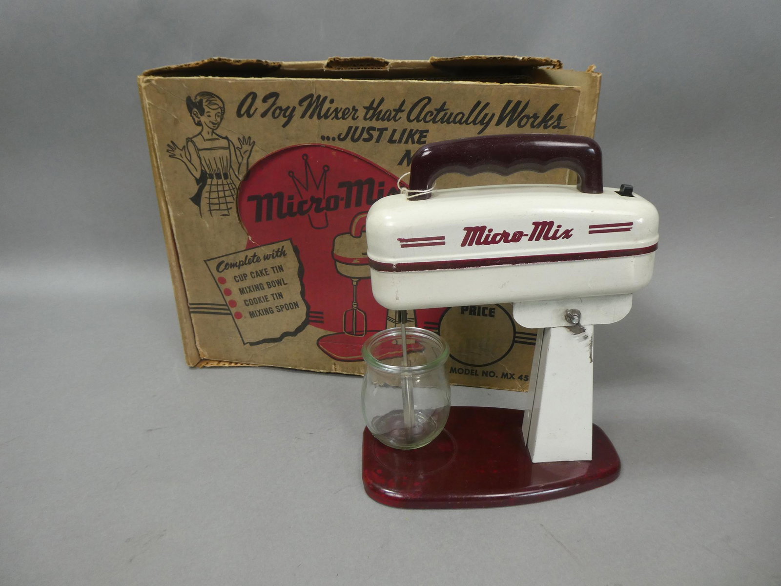 1950's Micro-Mix Battery-Op Toy Mixer in Box: 1950's Micro-Mix Battery-Op Toy Mixer in Box. Measurements in inches: 11 high x 8 x 4 Condition:Box well worn and soiled Shipping:We offer in-house shipping. Item(s) will be packed after invoice is pa