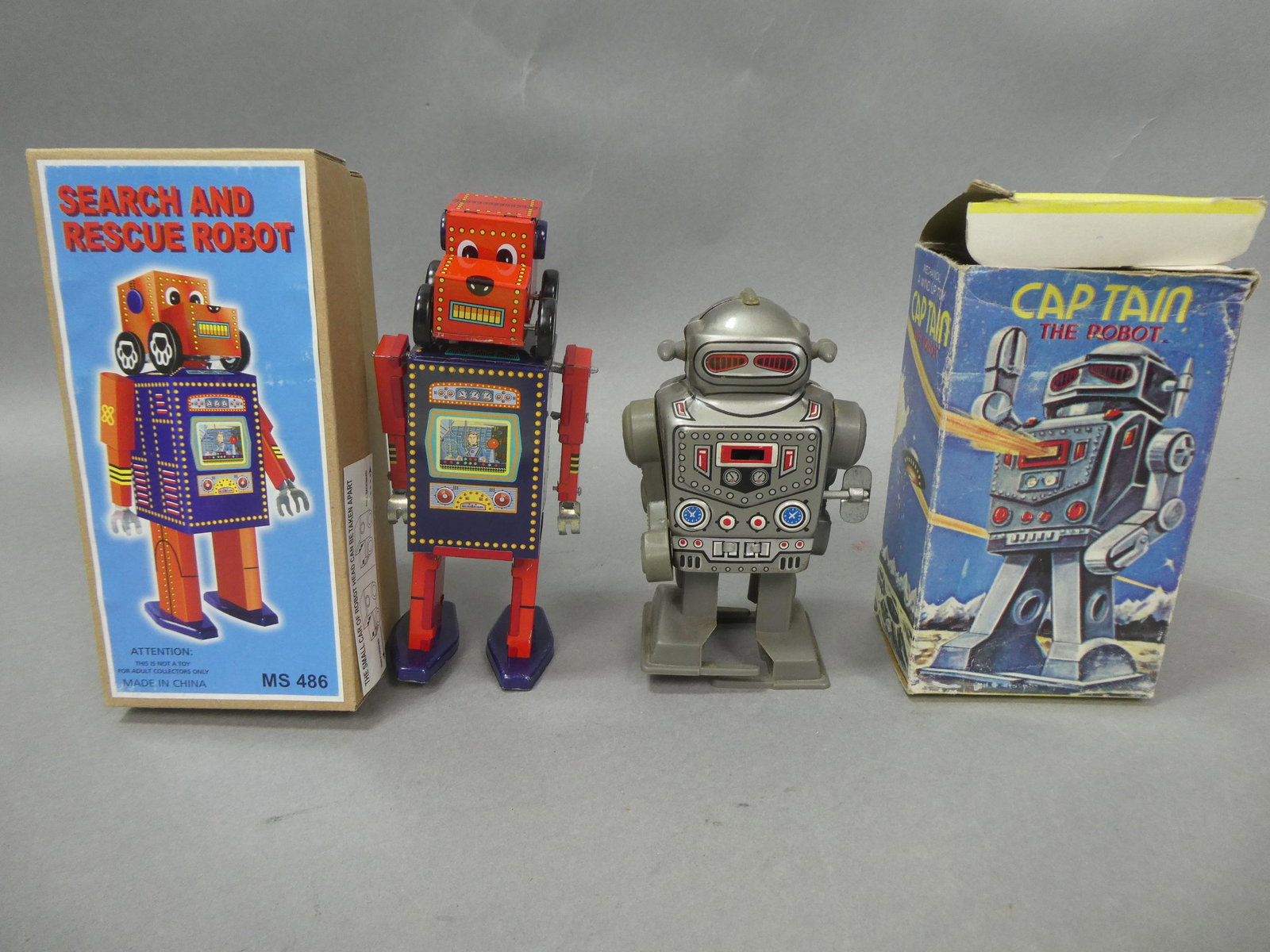 2 NOS Robots Captain & Search and Rescue in Boxes: 2 NOS Robots Captain & Search and Rescue in Boxes. Measurements in inches: 6 and 7 high Condition:New, never used Shipping:We offer in-house shipping. Item(s) will be packed after invoice is paid and 