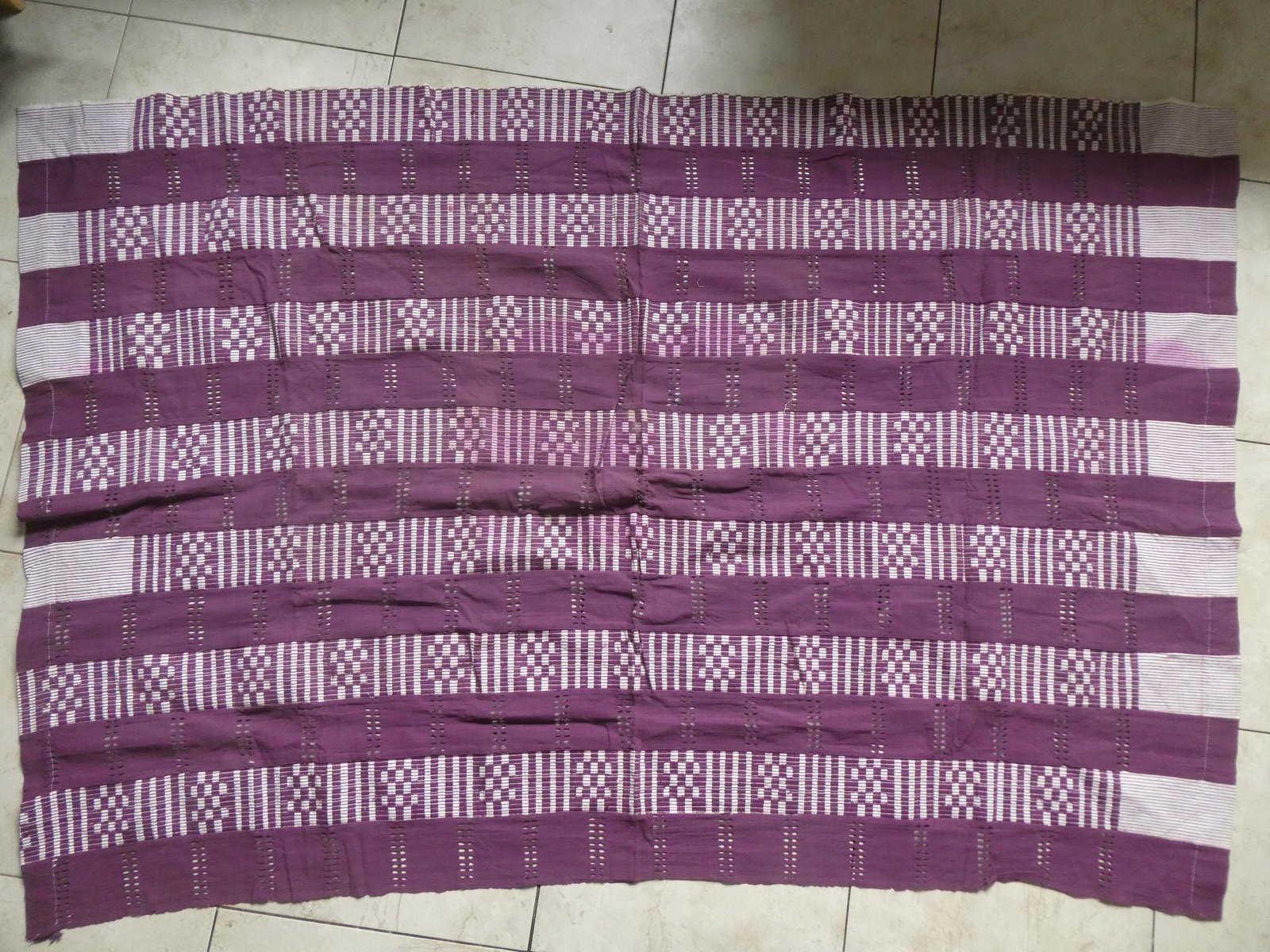 Yoruba Nigerian Ase-Oke Purple & White Textile: Yoruba Nigerian Ase-Oke Purple & White Textile.. Measurements in inches: 49 x 74 Condition:Has some staining Shipping:We offer in-house shipping. Item(s) will be packed after invoice is paid and shipp