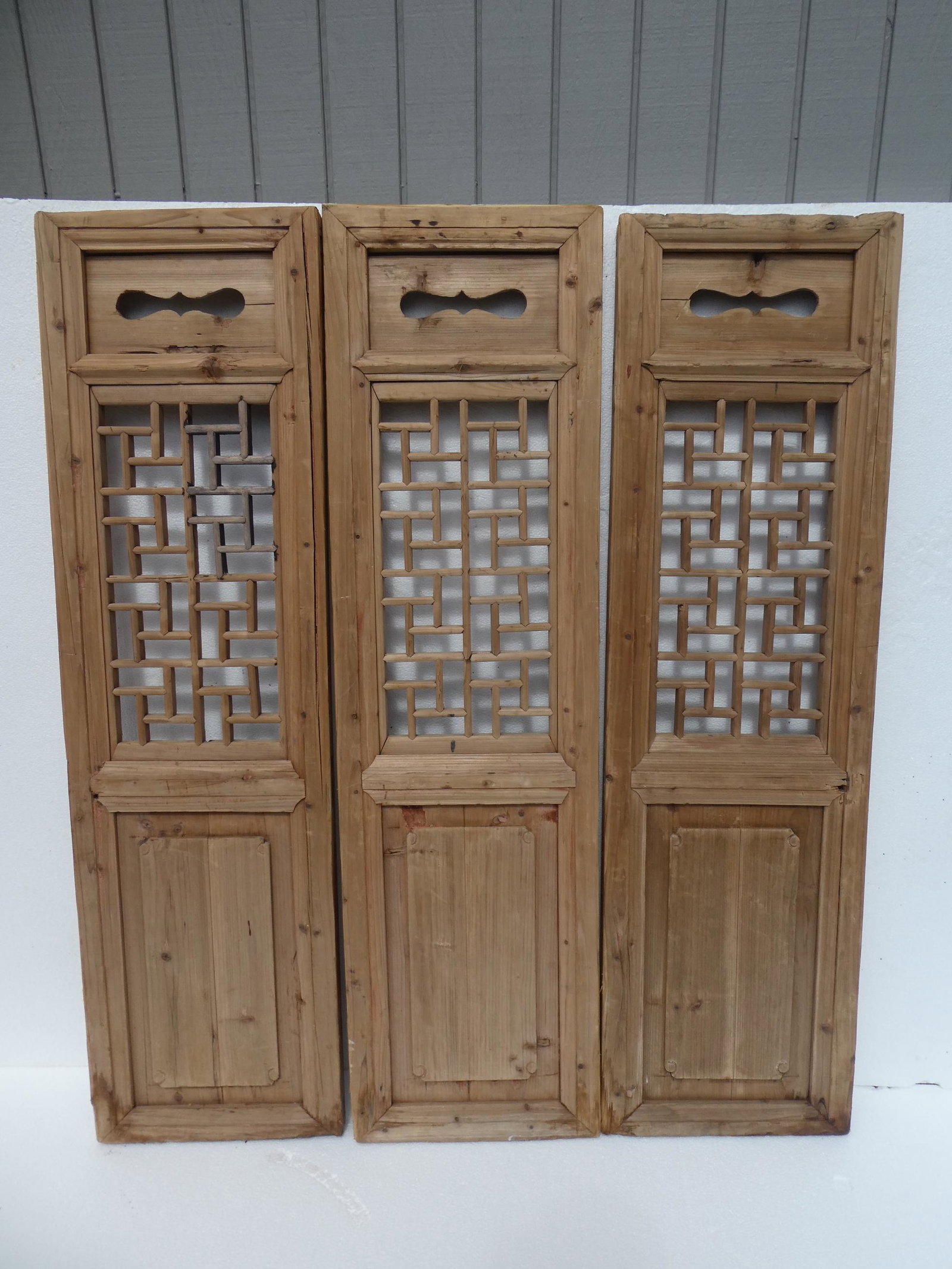 Late 19th Century Chinese 3 Piece Wood Carved Windows: Late 19th Century Chinese 3 Piece Wood Carved Windows from the Anhui province. Raw wood, ready to paint. Measurements in inches: 48 high x 13 1/2 wide Condition:Condition commensurate with age Shippin