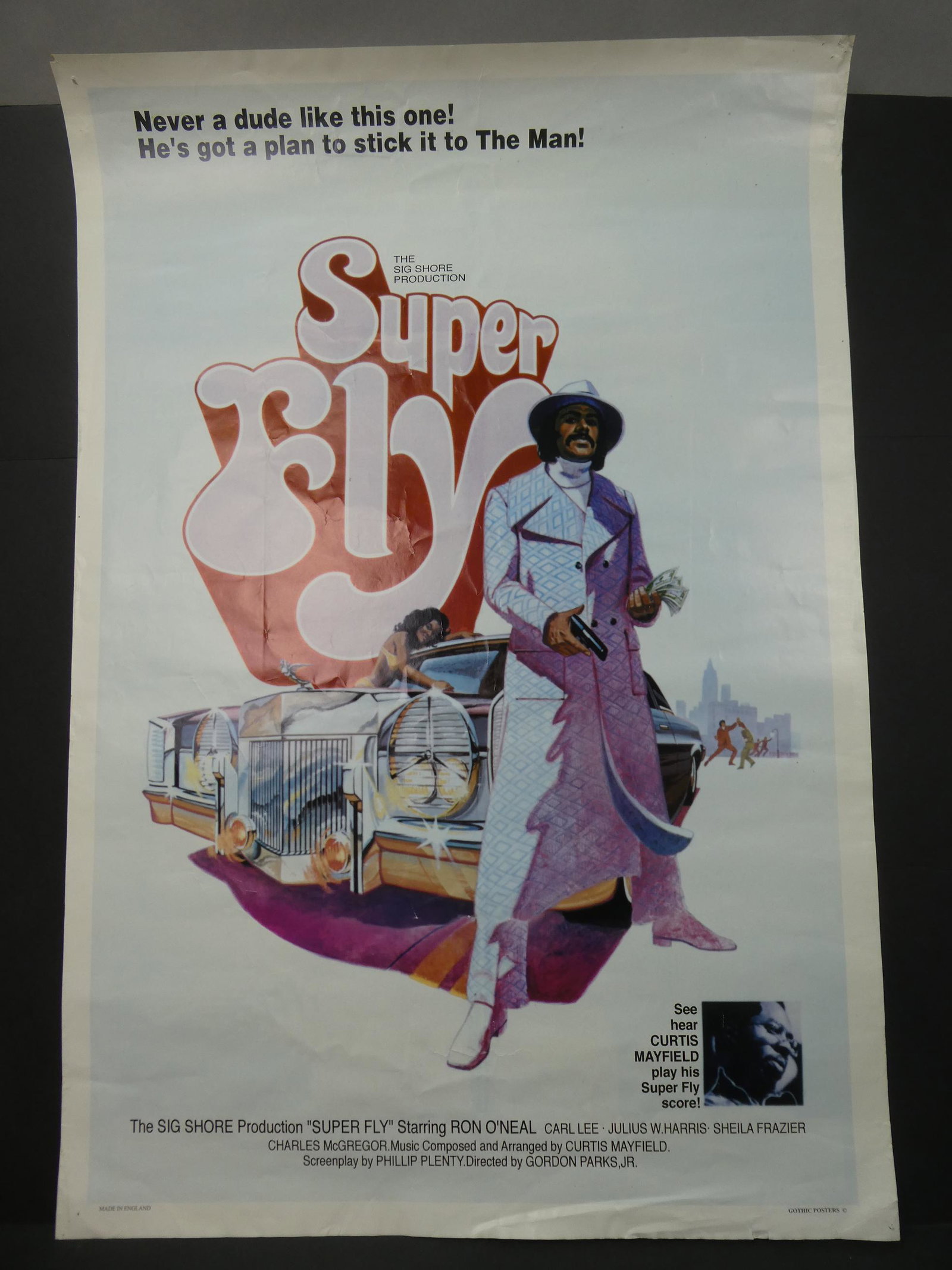 Original Super Fly Movie Poster by Gothic: Original Super Fly Movie Poster by Gothic. Measurements in inches: 25 x 36 Condition:Has pin holes in corners, tears on edges and mild creasing Shipping:We offer in-house shipping. Item(s) will be pac