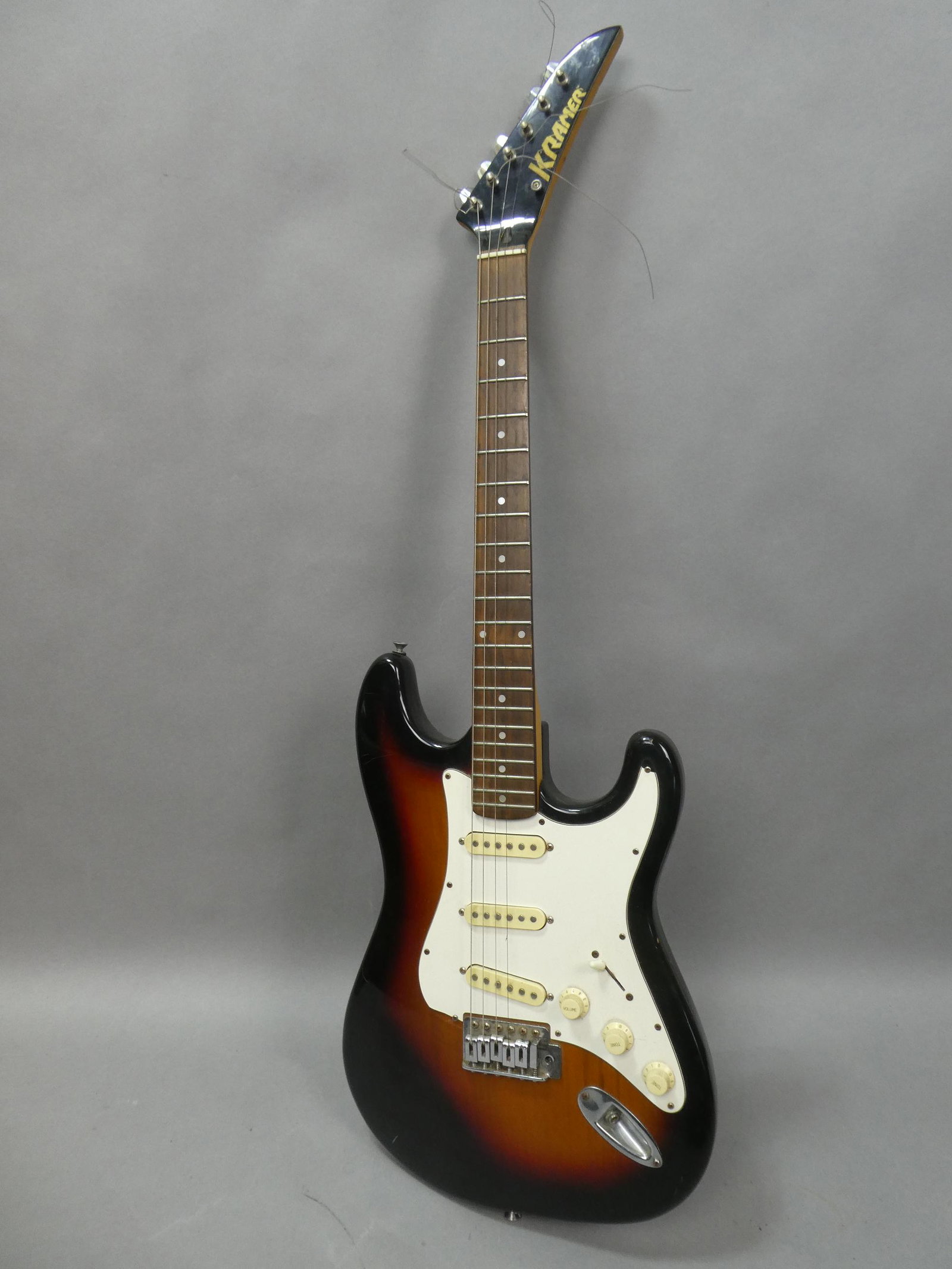 Kramer Model KS-400 Stratocaster Electric Guitar: Kramer Model KS-400 Stratocaster Electric Guitar. Measurements in inches: 39 long Condition:As found, has scratches. Not working Shipping:We offer in-house shipping. Item(s) will be packed after invoi