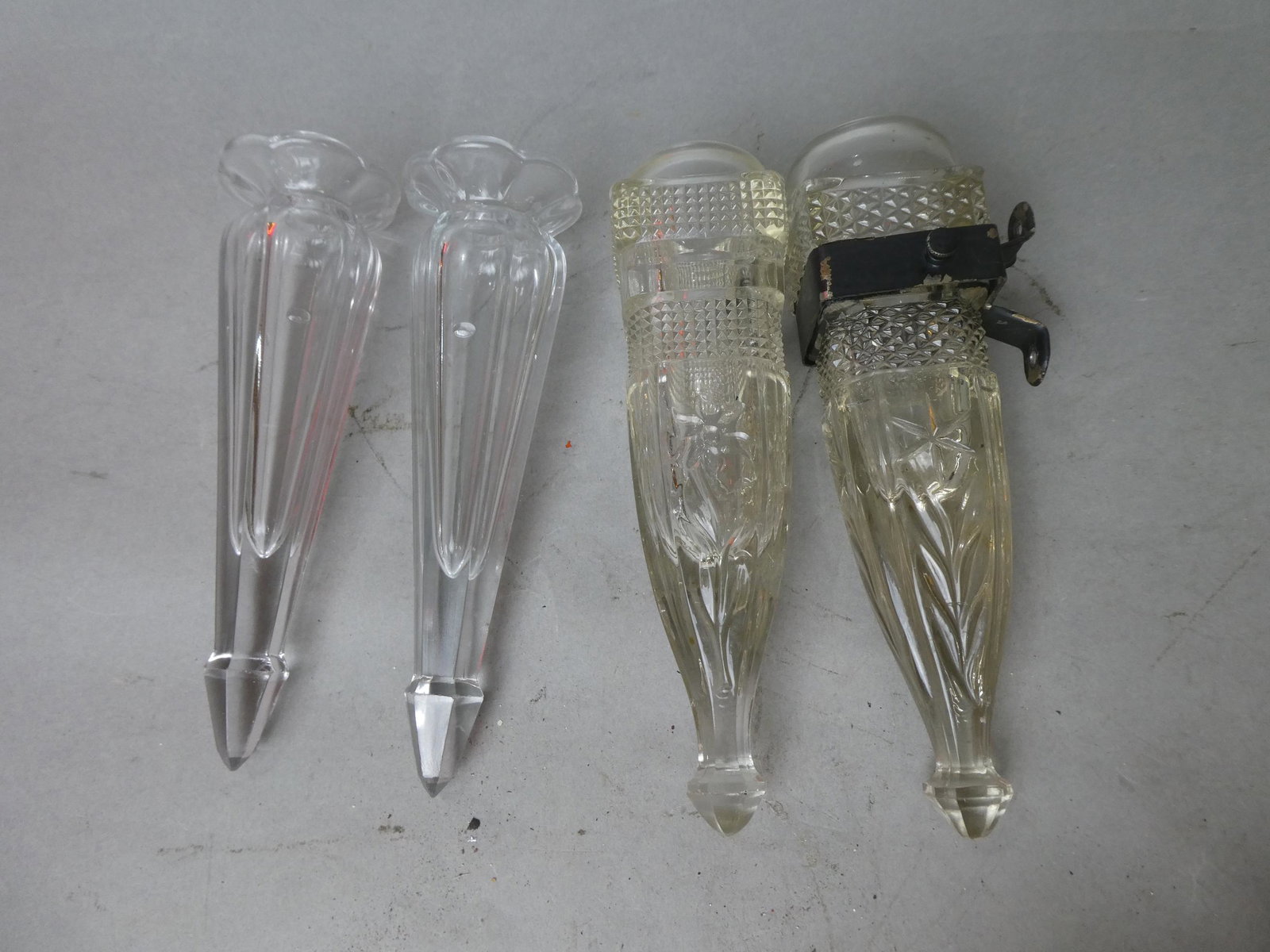 Lot 4 Antique Automobile Pressed Glass Flower Bud Vases: Lot 4 Antique Automobile Pressed Glass Flower Bud Vases with on bracket. Measurements in inches: around 7 1/2 long Condition:Good with no chips, cracks or repairs Shipping:We offer in-house shipping. 