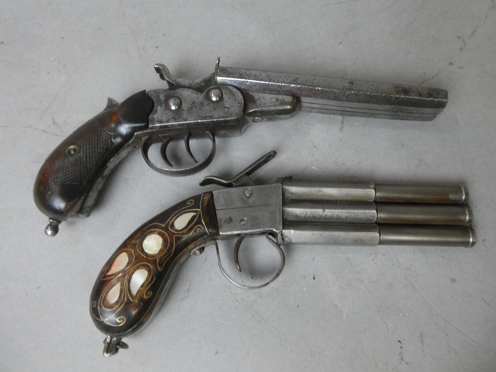 Lot 2 Pirate Pistol Replica Prop Guns Domingo Alberto F: Lot 2 Pirate Pistol Replica Prop Guns, one marked Domingo Alberto Fibar. Measurements in inches: 9 and 10 1/2 long Condition:Well worn with age and use Shipping:We offer in-house shipping. Item(s) wil