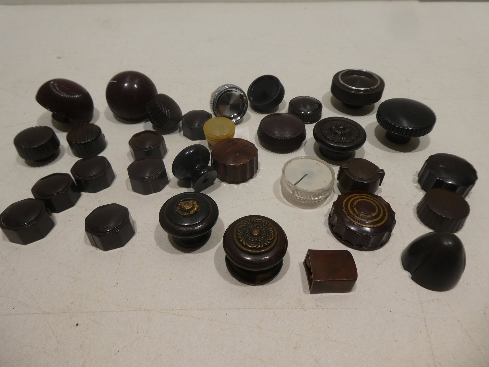 Lot 30 assorted Antique Wooden Radio Knobs: Lot 30 assorted Antique Wooden Radio Knobs. Condition:Normal wear with age and use Shipping:We offer in-house shipping. Item(s) will be packed after invoice is paid and shipping charge will be invoice