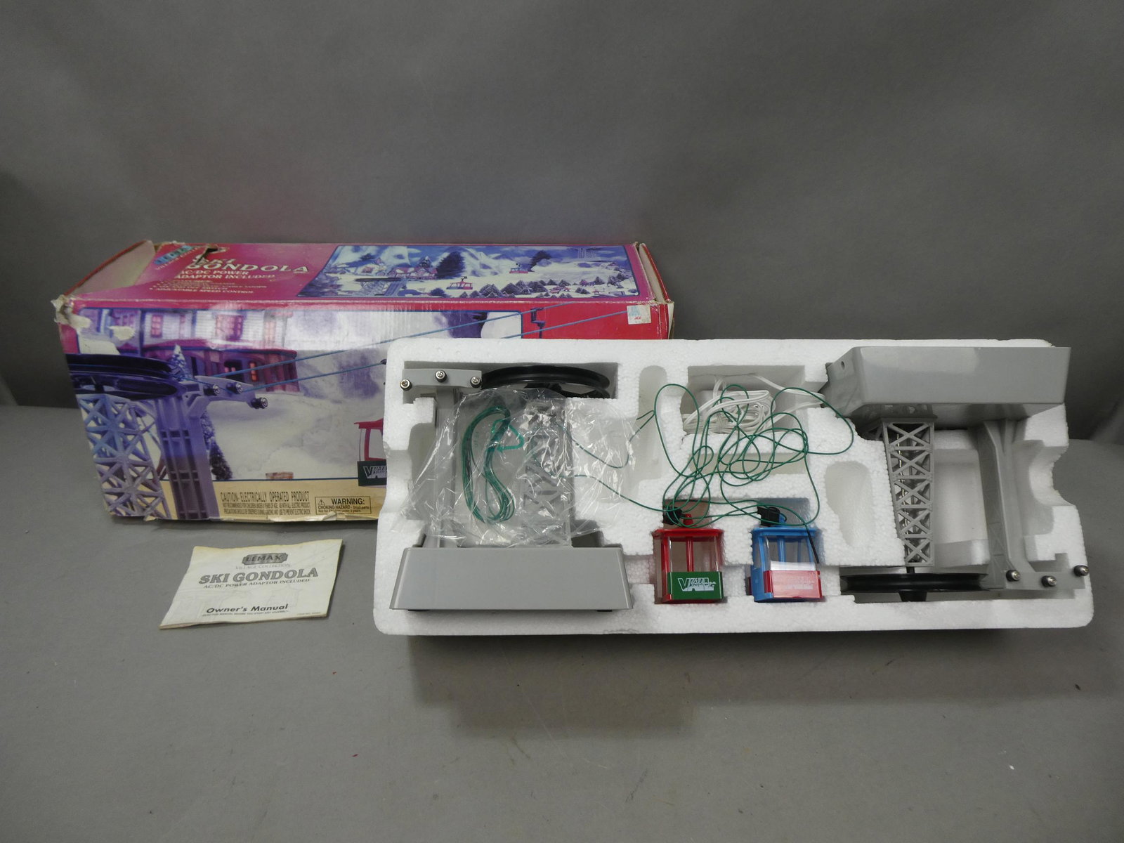 Lemax Village Collection Ski Gondola In Box: Lemax Village Collection Ski Gondola In Box. Condition:Looks little if ever used. Box is very rough Shipping:We offer in-house shipping. Item(s) will be packed after invoice is paid and shipping charg