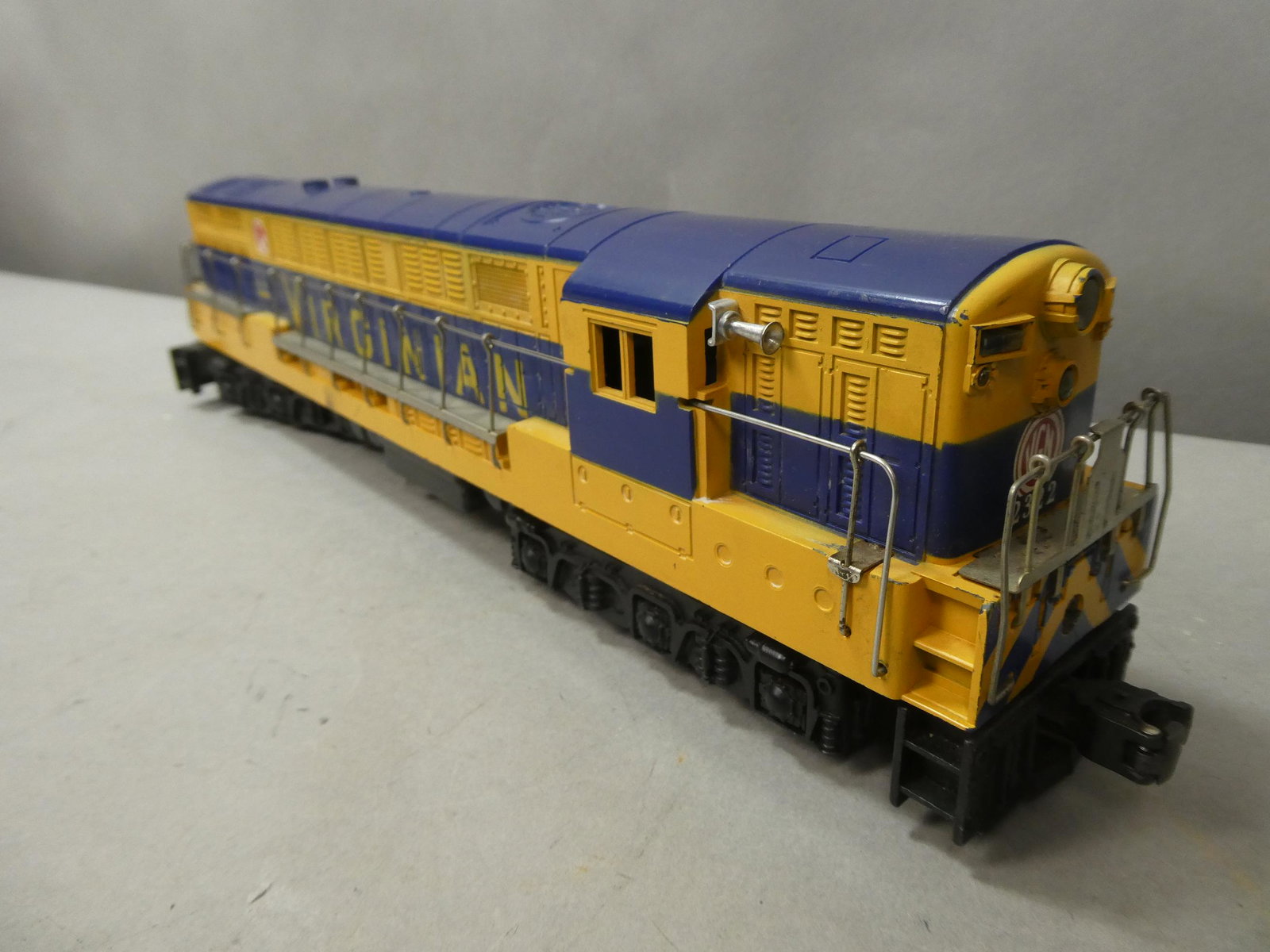 Lionel 2322O Gauge Virginian Trainsmaster Engine: Lionel 2322O Gauge Virginian Trainsmaster Engine. Condition:Not tested, Wheels turn freely. Normal wear with age and use Shipping:We offer in-house shipping. Item(s) will be packed after invoice is pa