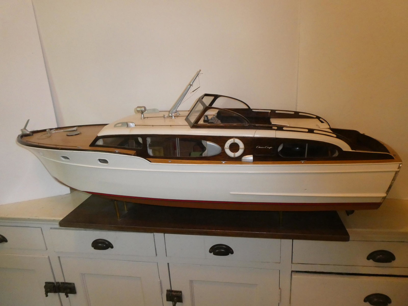 1950's HUGE Chris Craft Wood Scale Model: 1950's HUGE Chris Craft Wood Scale Model, heavily detailed inside and out. Has electric motor.. Measurements in inches: 48 long x 14 x 13 high Condition:Has two broken wooden pieces, otherwise very cl