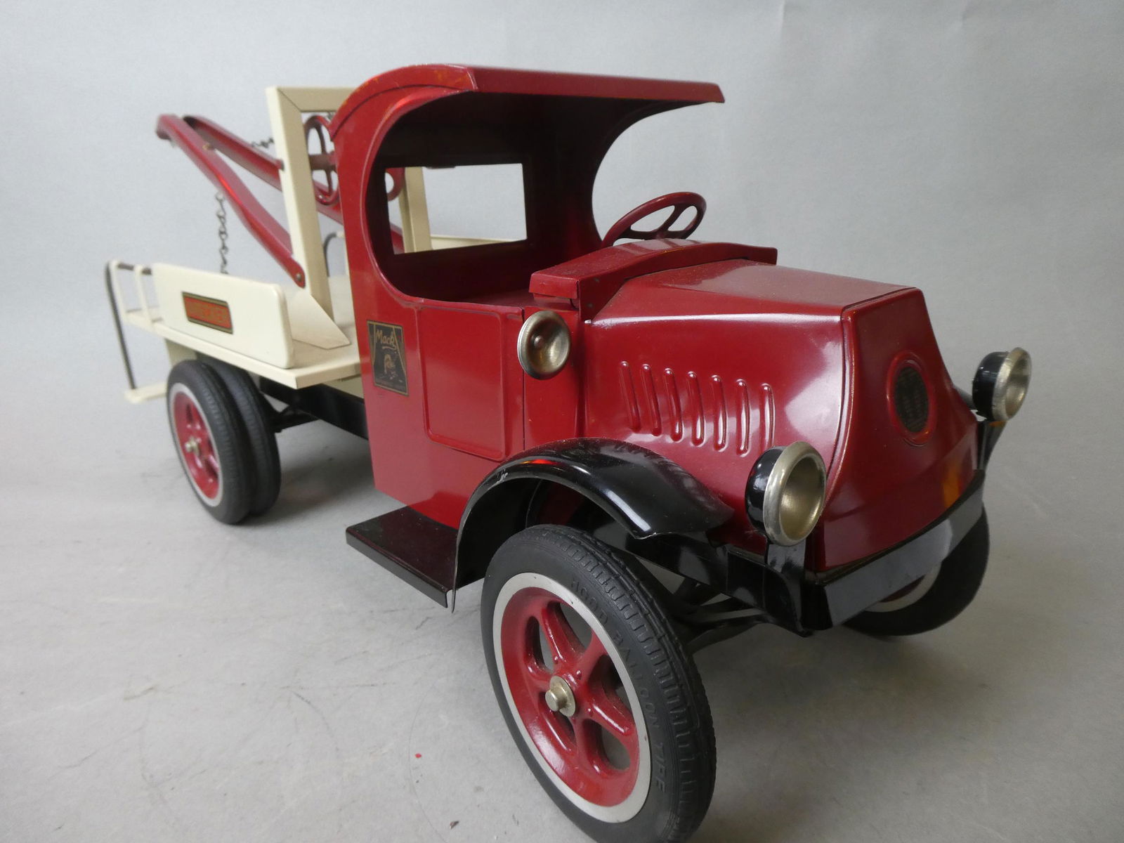 1930s Pressed Steel Mack Tow Truck Wrecker Reproduction: 1930s Pressed Steel Mack Tow Truck Wrecker, custom modern creation. Measurements in inches: 24 long Condition:Good with no problems Shipping:We offer in-house shipping. Item(s) will be packed after in
