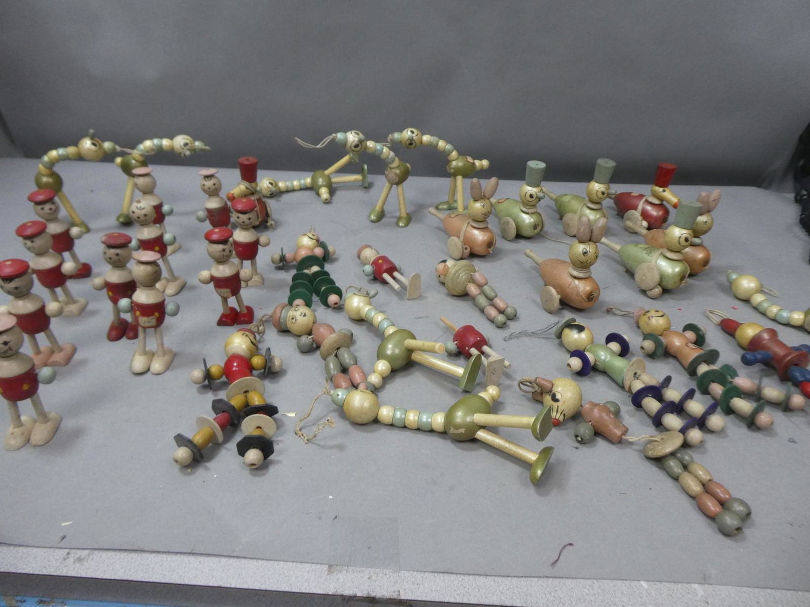 Large Lot Antique Painted Wooden String Toys: Large Lot Antique Painted Wooden String Toys. Condition:Normal wear with age and use Shipping:We offer in-house shipping. Item(s) will be packed after invoice is paid and shipping charge will be invoi