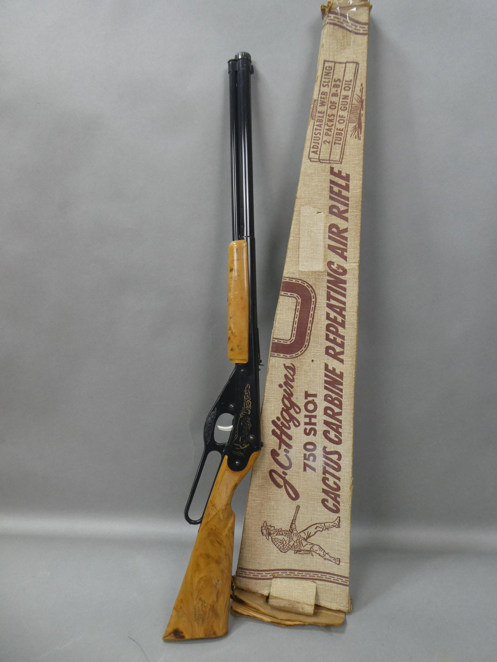Vintage JC Higgins Cactus Carbine Repeating Air Rifle: Vintage JC Higgins Cactus Carbine Repeating Air Rifle with box. Measurements in inches: 34 long Condition:Some wear to box, rifle looks little if ever used Shipping:We offer in-house shipping. Item(s)