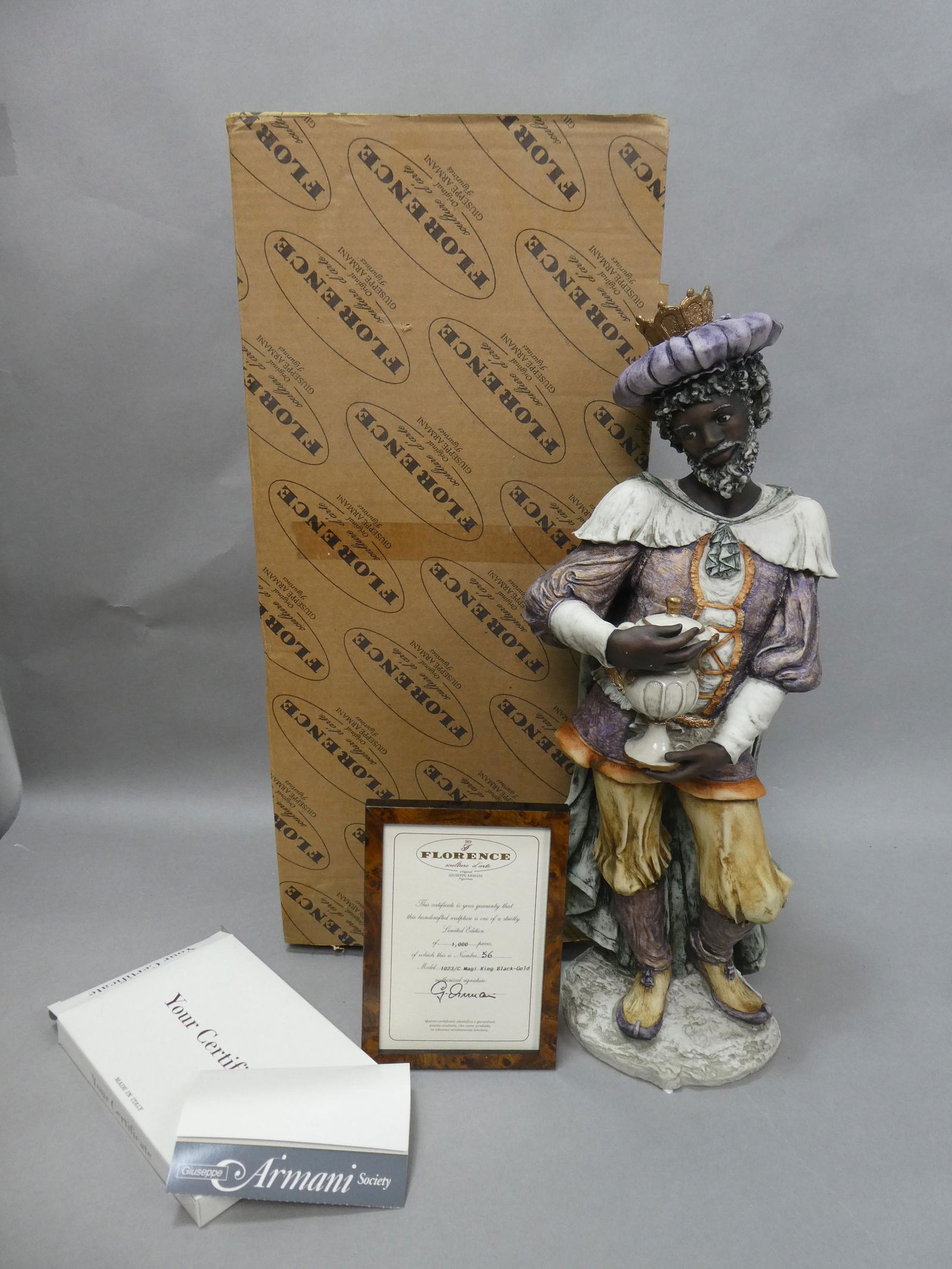 Guiseppe Armani Florence Knelt Magi King Sculpture: Guiseppe Armani Florence Knelt Magi King: Black-Gold model 1023/C in box with certificate of authenticity. Limited Edition 56/1000.. Measurements in inches: 19 high Condition:Good with no problems Shi