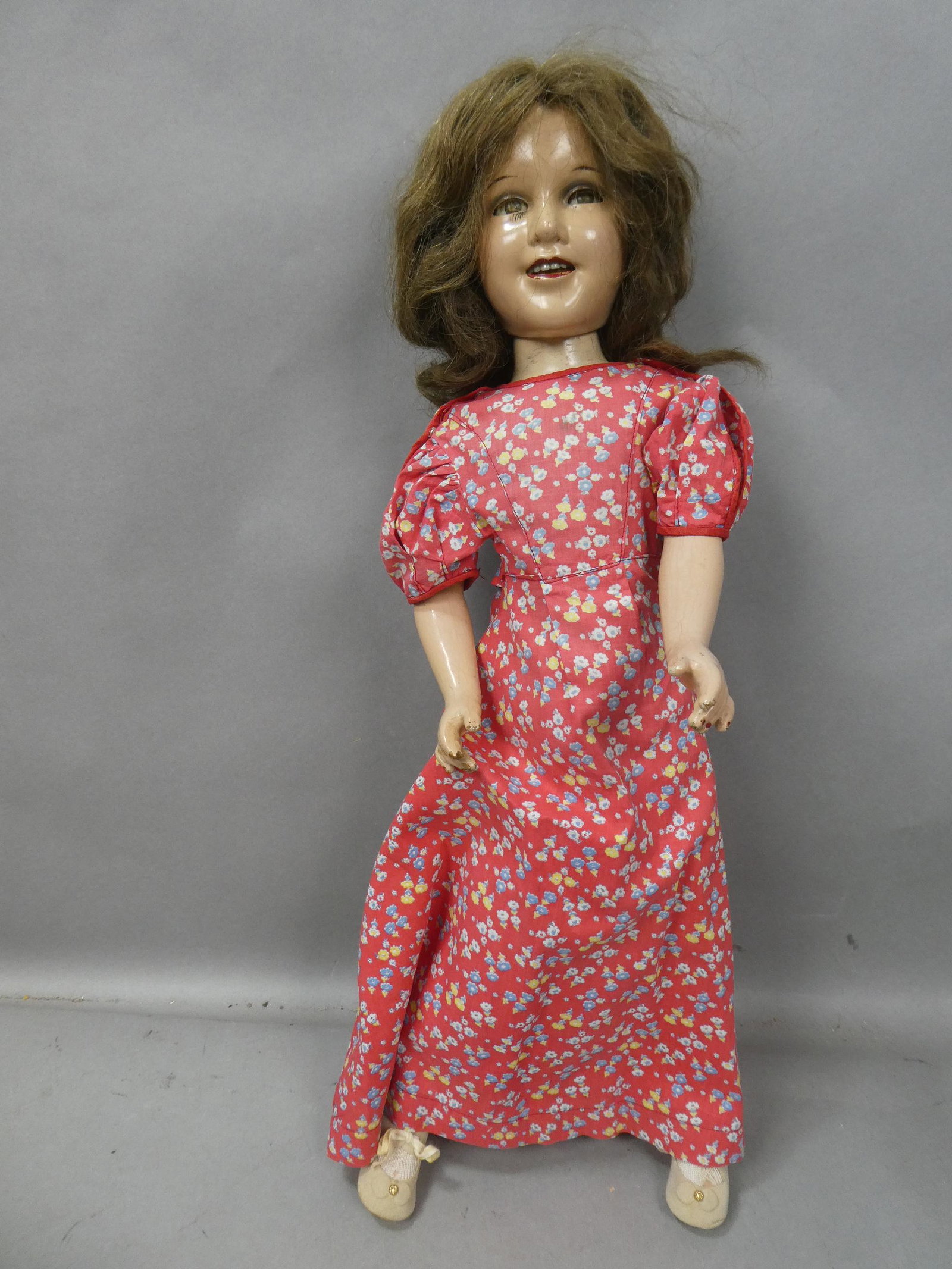 1938 Ideal Deanna Durbib 24" Composition Doll: 1938 Ideal Deanna Durbib 24" Composition Doll. Measurements in inches: 24 high Condition:Has restored face that shows crazing as well as legs, chips on fingers Shipping:We offer in-house shipping. Ite