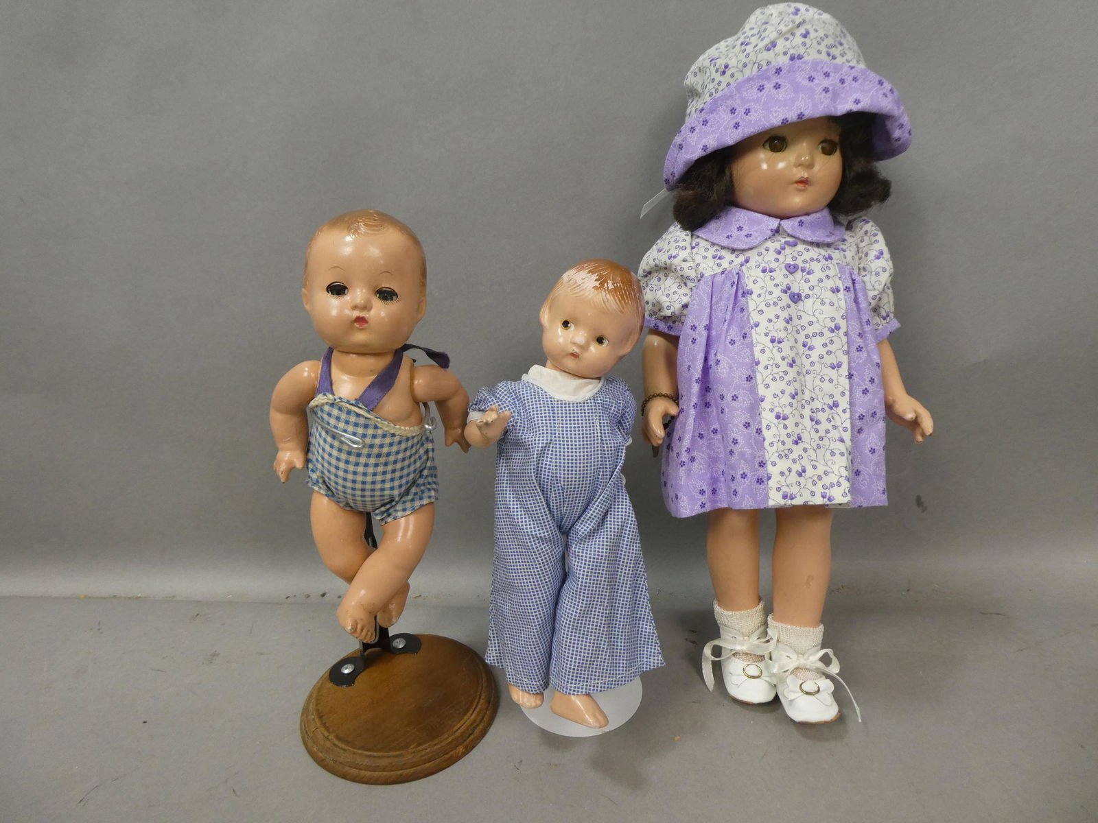 3 1930's Effanbee Composition Dolls Patsy Patsyette etc: 3 1930's Effanbee Composition Dolls including Patricia, Patsy Babyette and Patsyette. Measurements in inches: 9, 9 and 14 high Condition:General wear with age, chipping on back of neck or Patsyette Sh