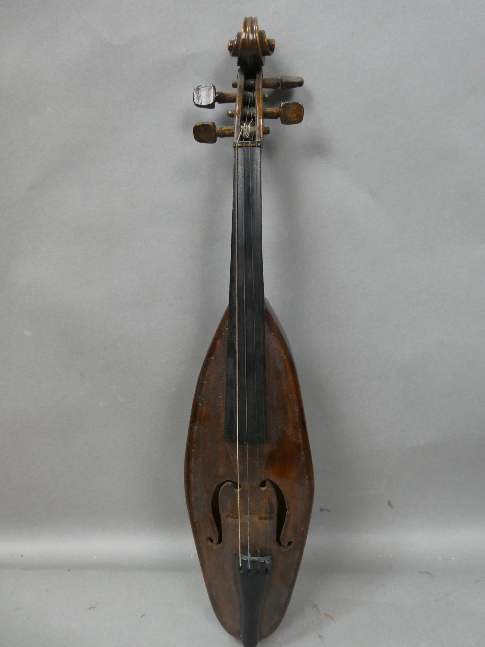 Vintage Wooden Unmarked Baglama Stringed Instrument: Vintage Wooden Unmarked Baglama Stringed Instrument. Measurements in inches: 24 long Condition:Good with no problems Shipping:We offer in-house shipping. Item(s) will be packed after invoice is paid a