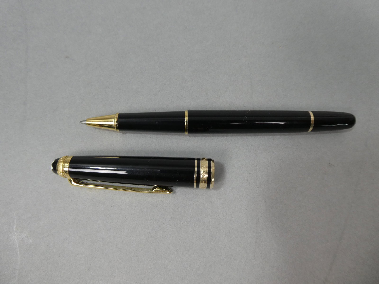 Montblanc Black Meisterstruck 75 Years Diamond & Gold Ballpoint Pen: Montblanc Black Meisterstruck 75 Years Diamond & Gold Ballpoint Pen. Measurements in inches: 5 1/2 diameter Condition:Little if ever used Shipping:We offer in-house shipping. Item(s) will be packed af