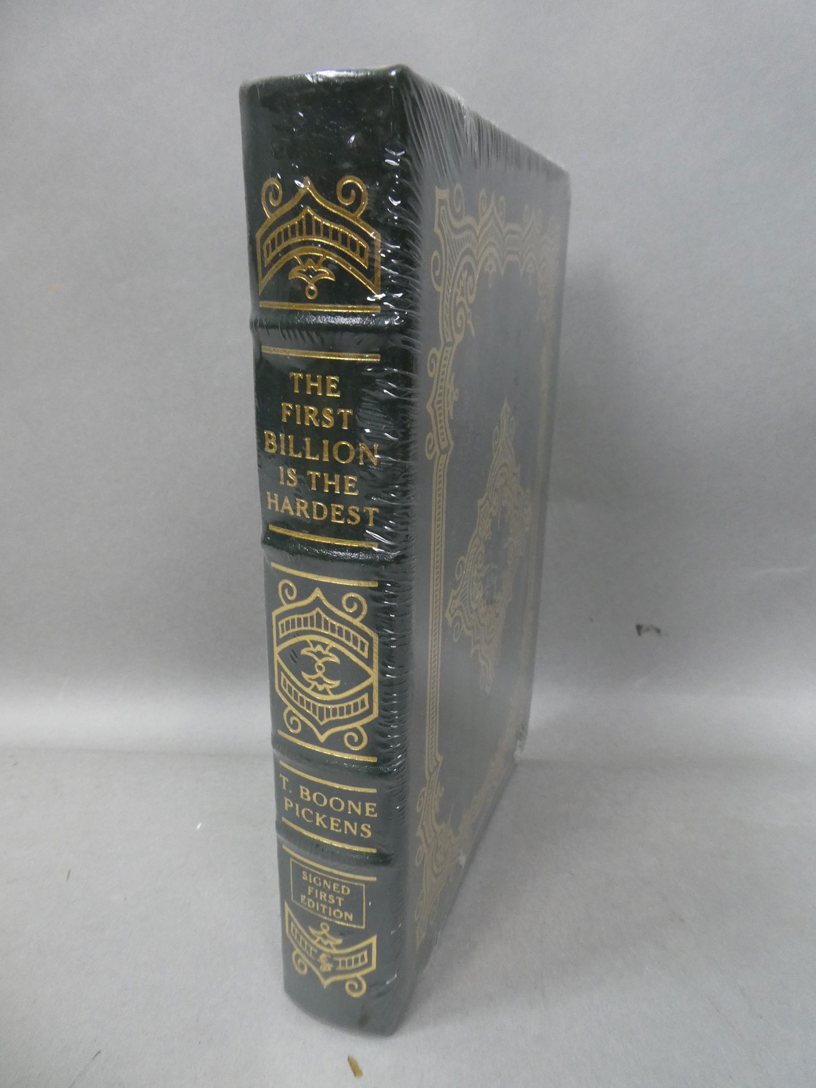 2008 Easton Press First Billion is the Hardest Pickens: 2008 Easton Press First Billion is the Hardest by T Boone Pickens. Signed First Edition. Measurements in inches: 9 1/2 x 6 1/2 Condition:Still sealed Shipping:We offer in-house shipping. Item(s) will