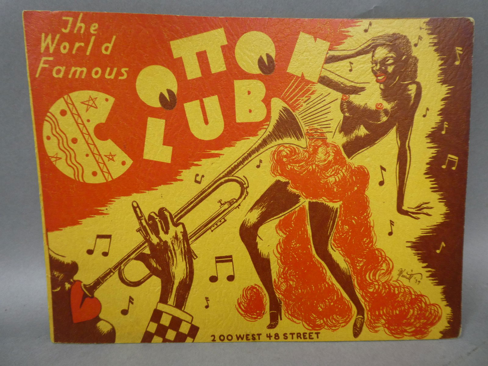 1939 World Famous Cotton Club Black Jazz Photo Folder: 1939 World Famous Cotton Club Black Jazz Photo Folder with old photo inside. Measurements in inches: 9 x 6 1/2 Condition:Mild wear with age and use Shipping:We offer in-house shipping. Item(s) will be